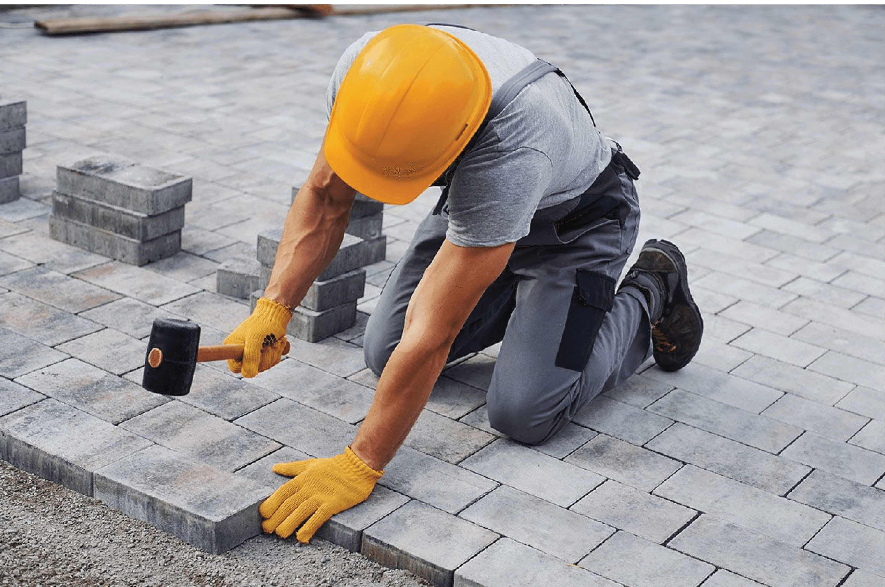 Man working with pavers