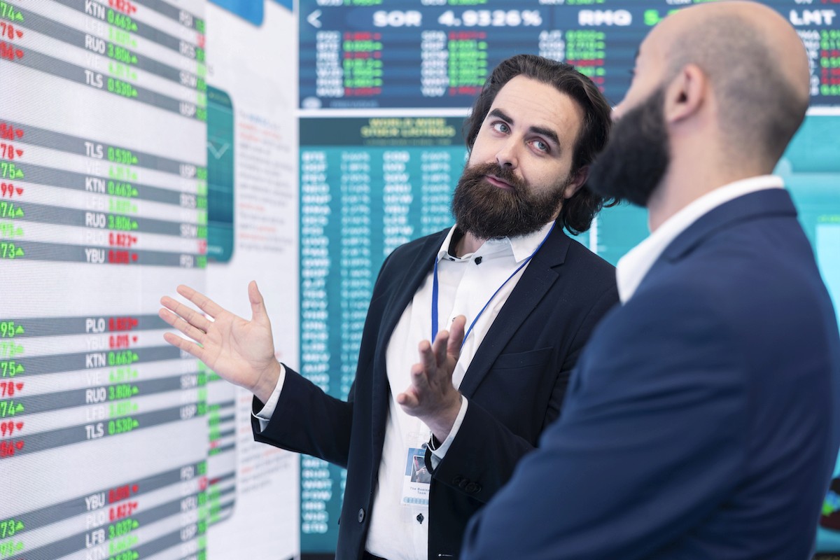 Coach explaining something to an athlete