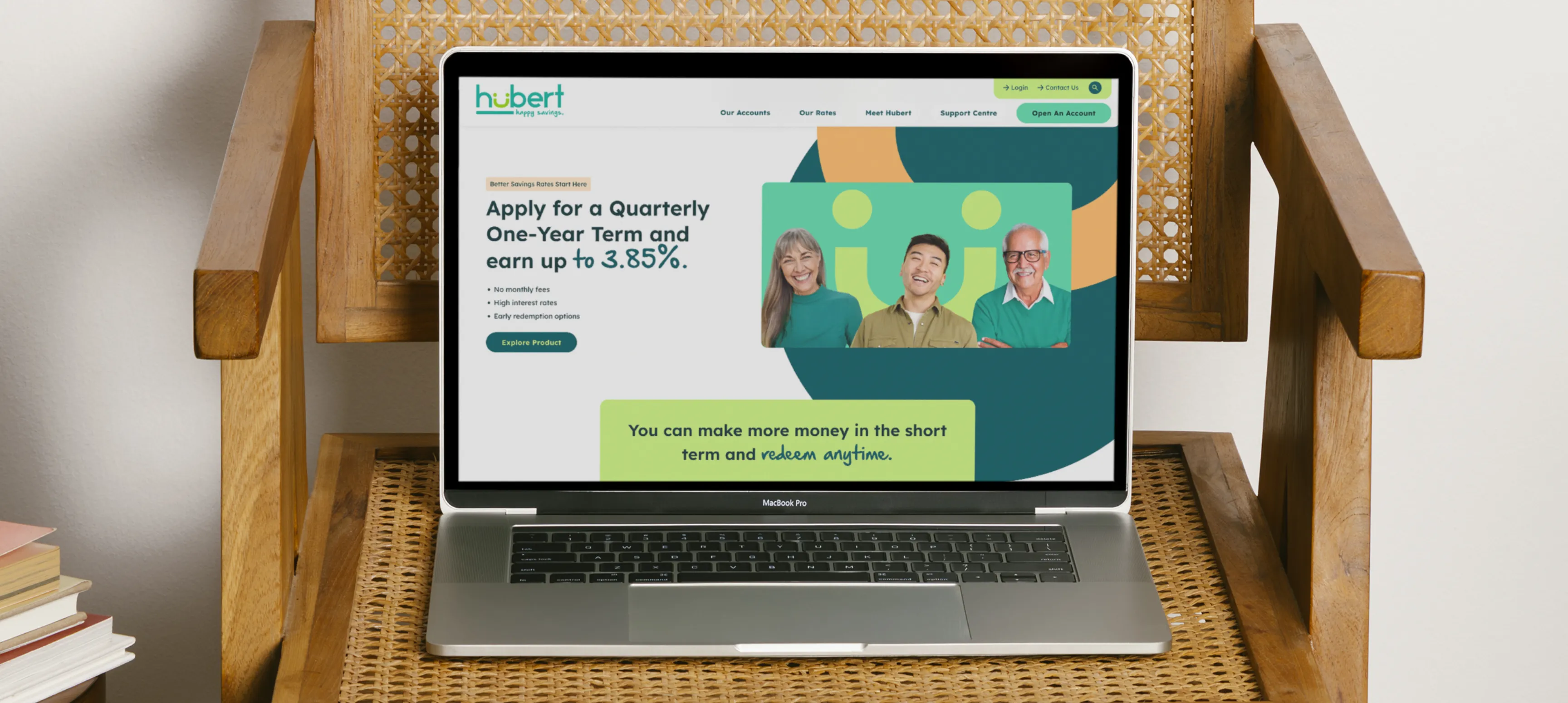 The Hubert Financial Home page on a laptop that's sitting on a ritan chair. 