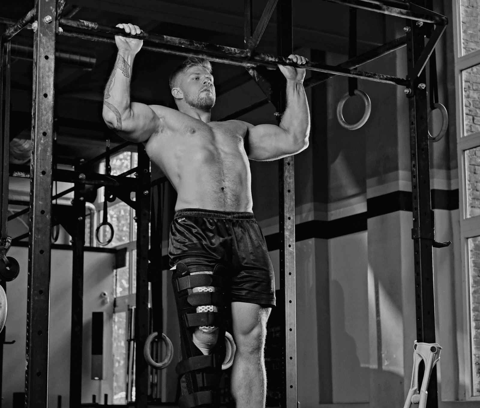 Confident man training strength and endurance