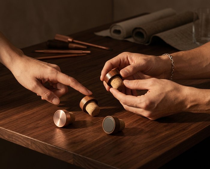 two poeple working on and comparing custom closures.