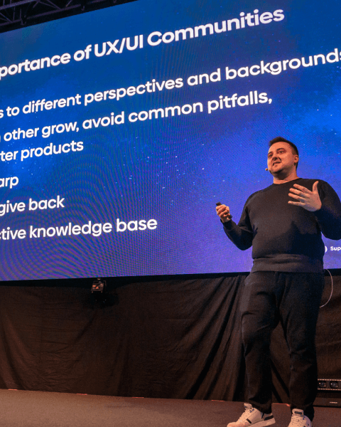 Supercharge Design team giving talks, mentoring, and connecting with the design community at conferences and workshops
