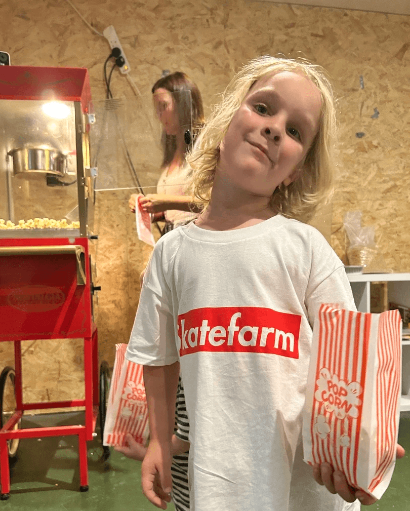 Girls skating together during a Sunday girls-only session at The Skate Farm indoor skatepark in Sussex