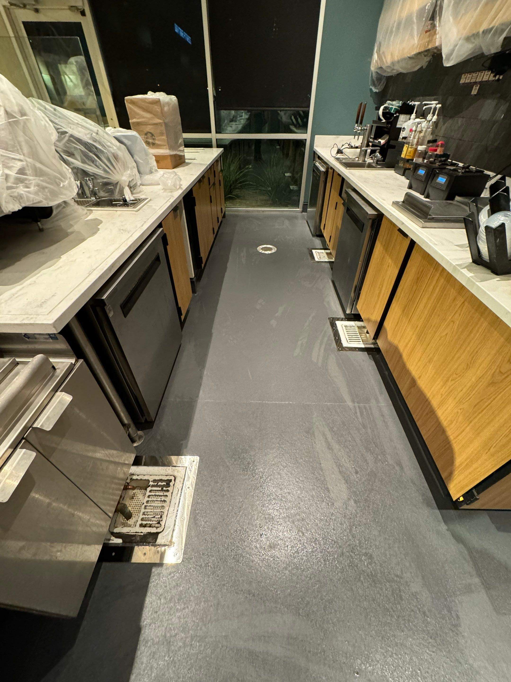 Properly installed Eco-Grip floor drain collar with smooth, sealed weld lines and a clean professional finish.