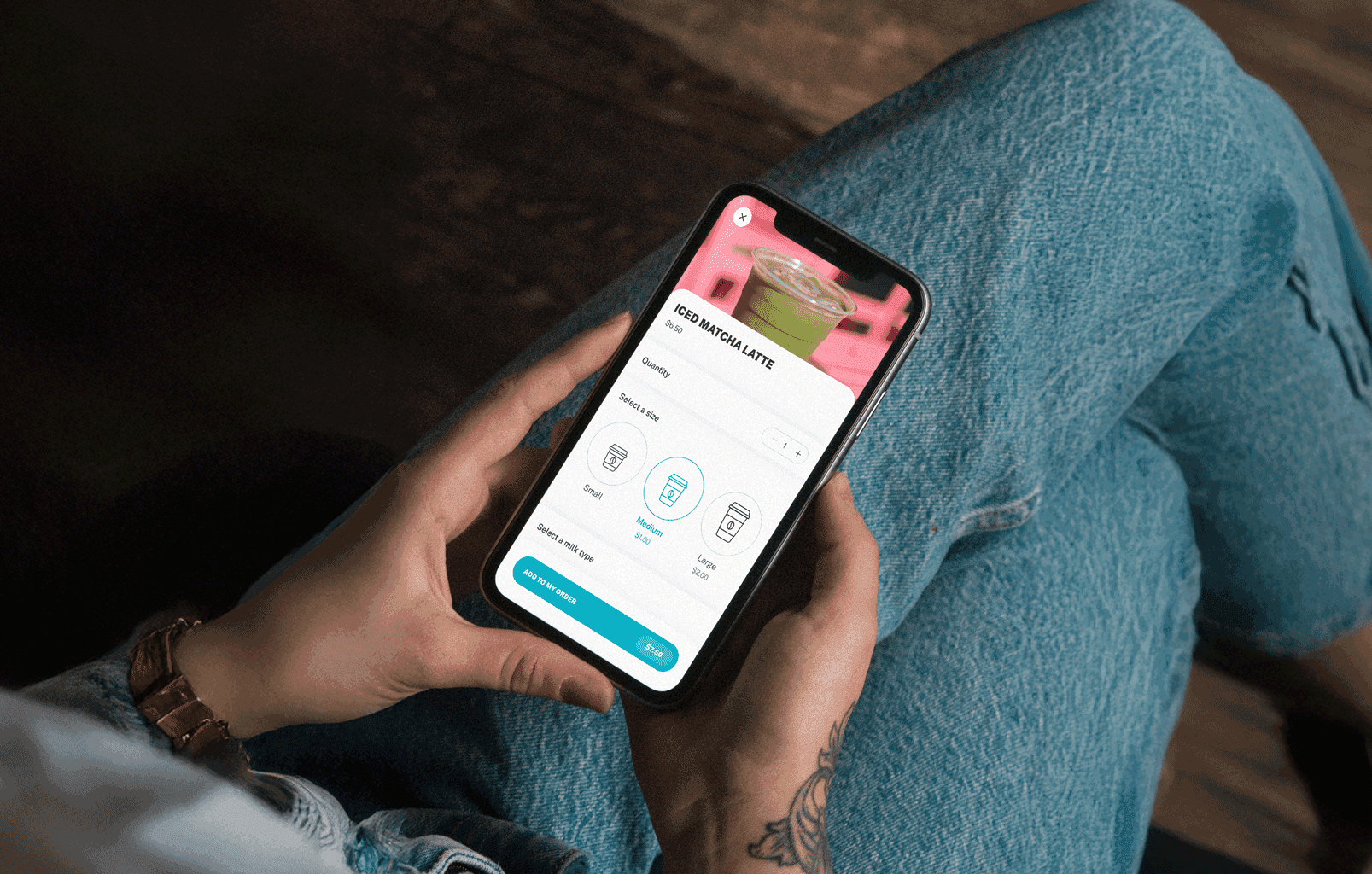 A person ordering an iced matcha latte from the 'Funk' app on their phone.