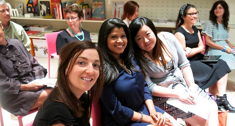 three students posing