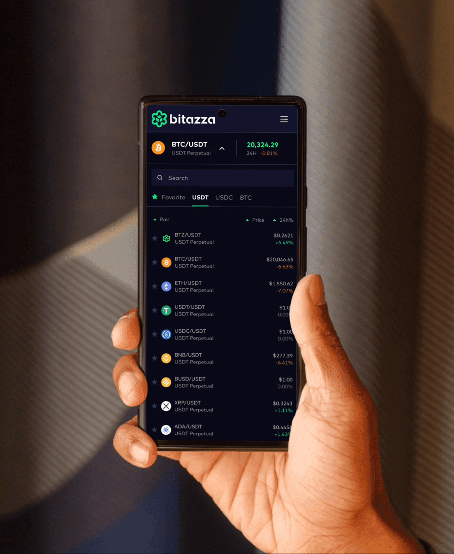 A hand holding a smartphone displaying the Bitazza mobile app market list. The UI shows a clean, searchable list of cryptocurrency pairs with real-time price updates and 24-hour percentage changes in a high-contrast dark mode.