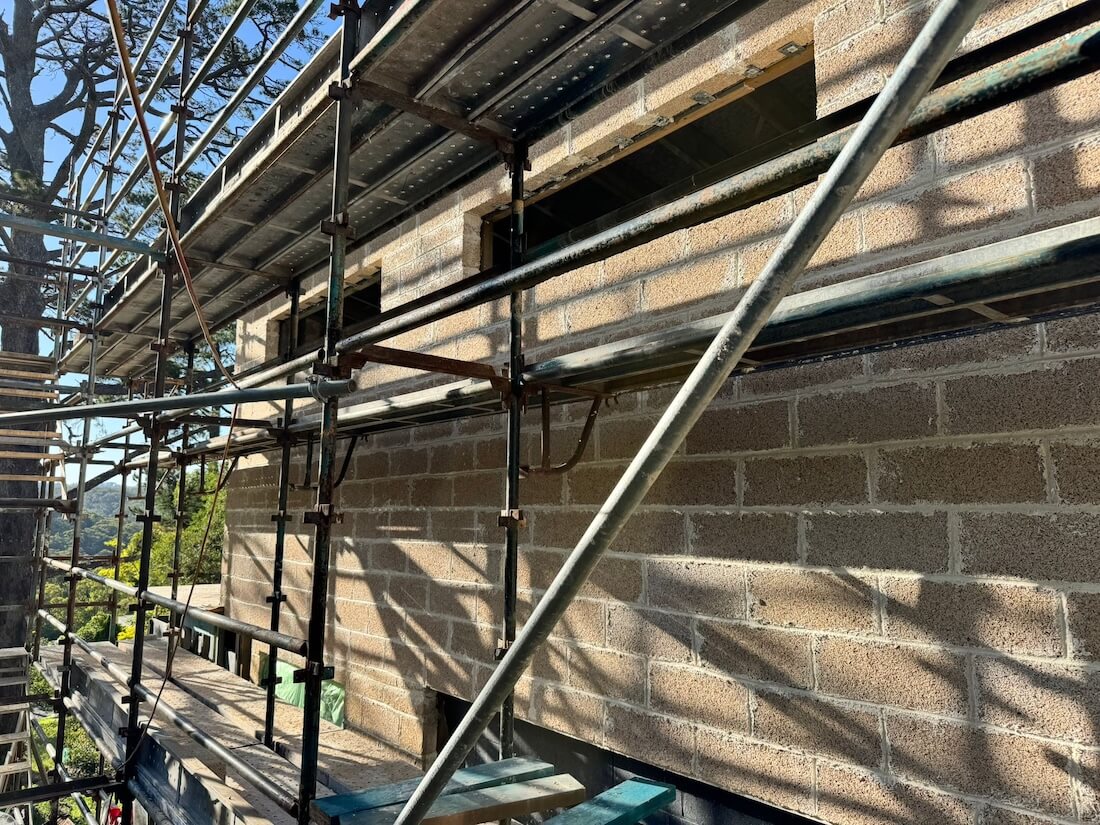 A house extension in progress, as hempcrete blocks are installed