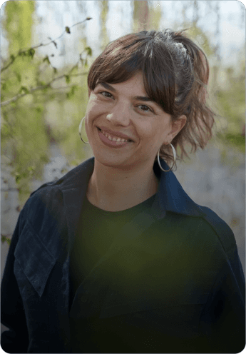 portrait photography of woman wearing brown headscarf