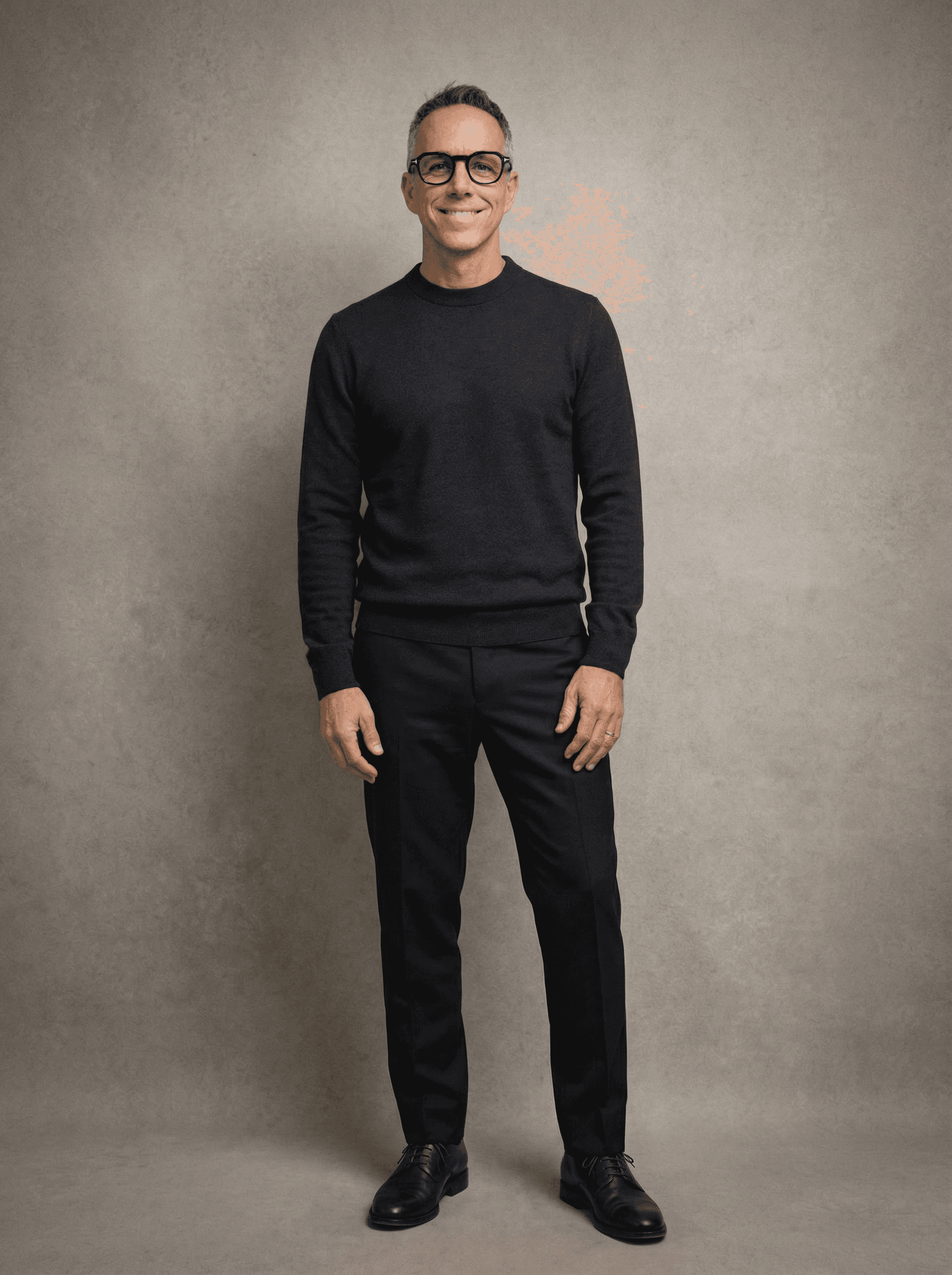 A silhouette of a person standing amidst vibrant swirling colors of teal and orange.