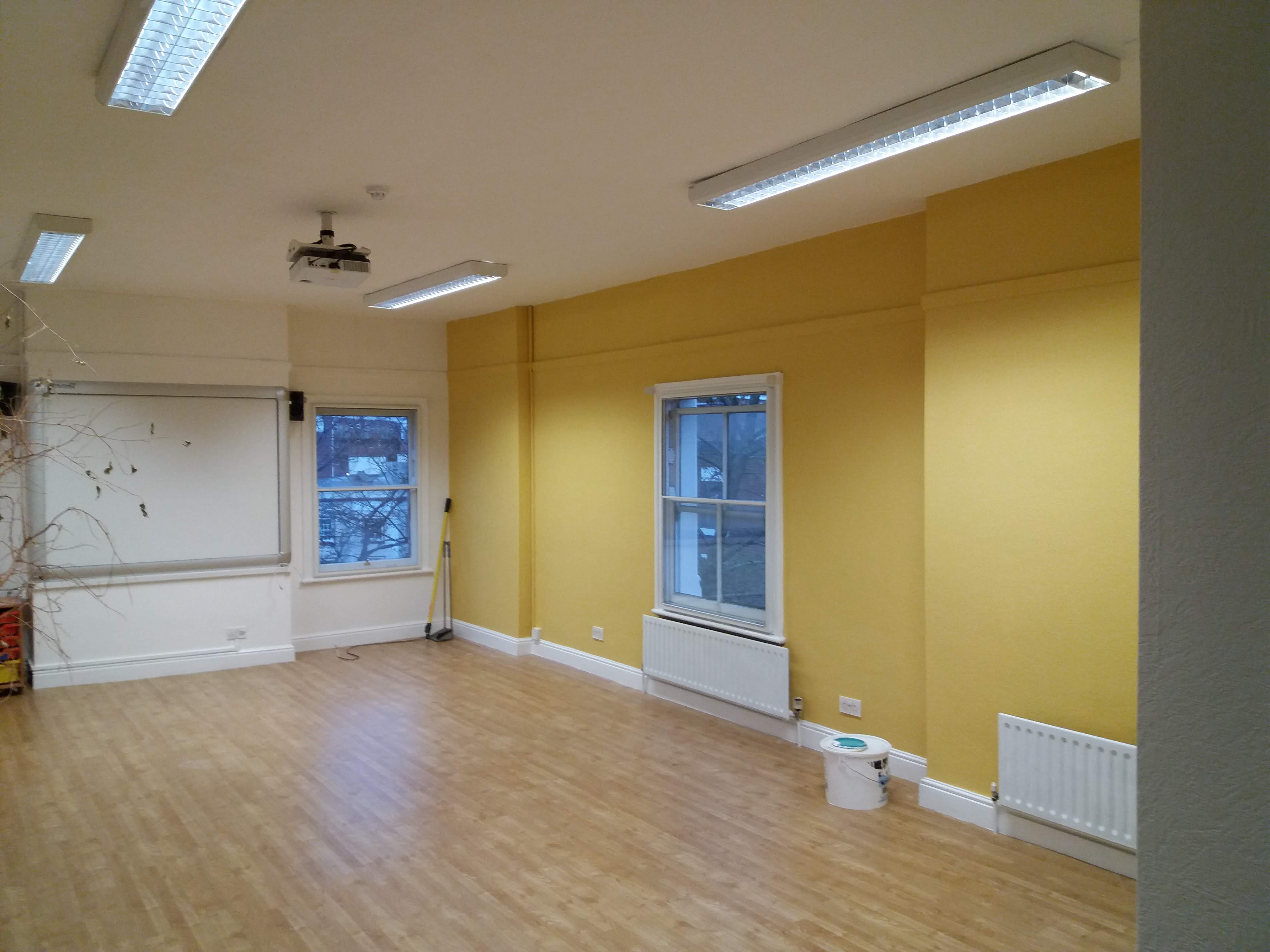 Inside a room with white and yellow walls