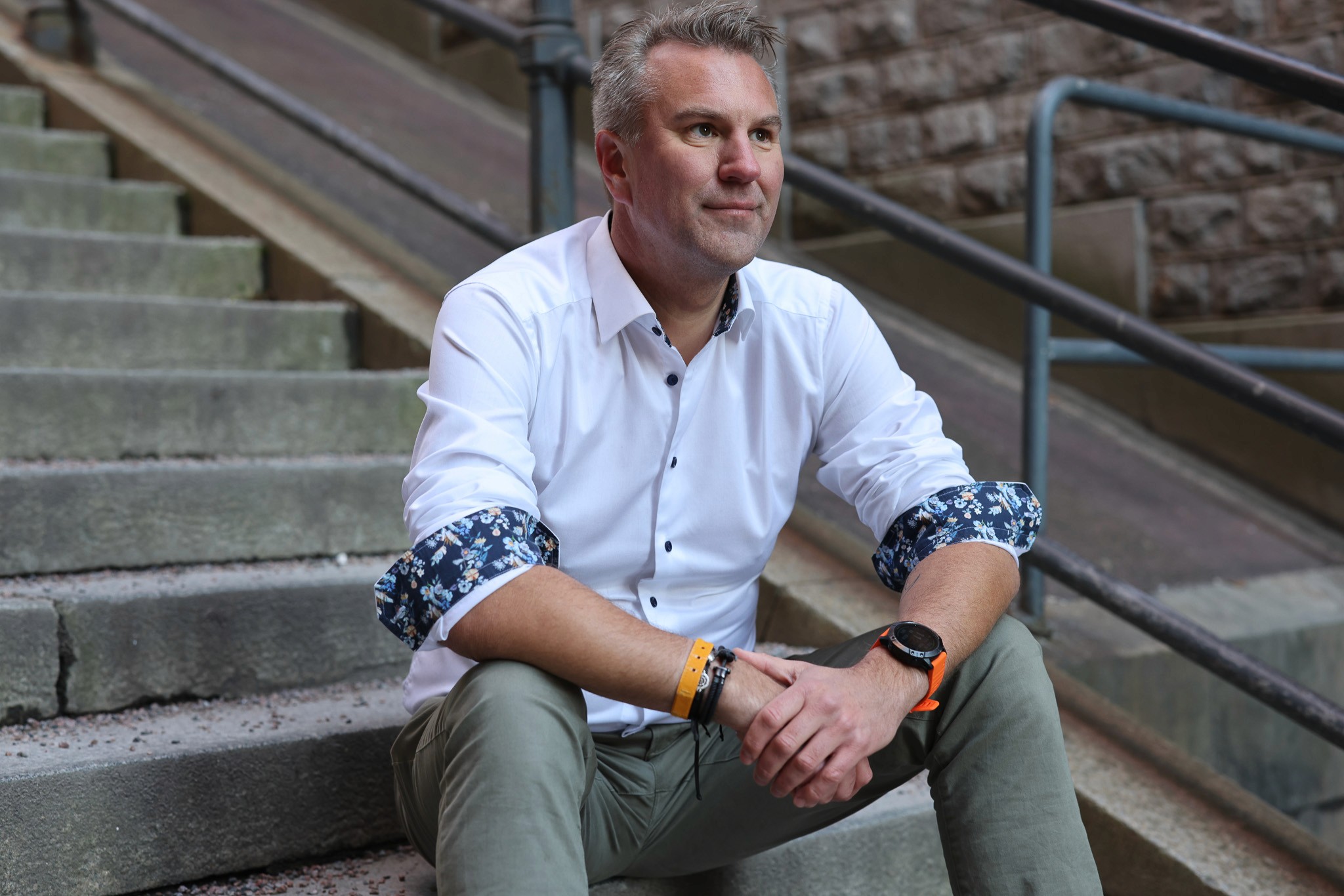 The team working together at a table with laptops, discussing business strategies or projects.
