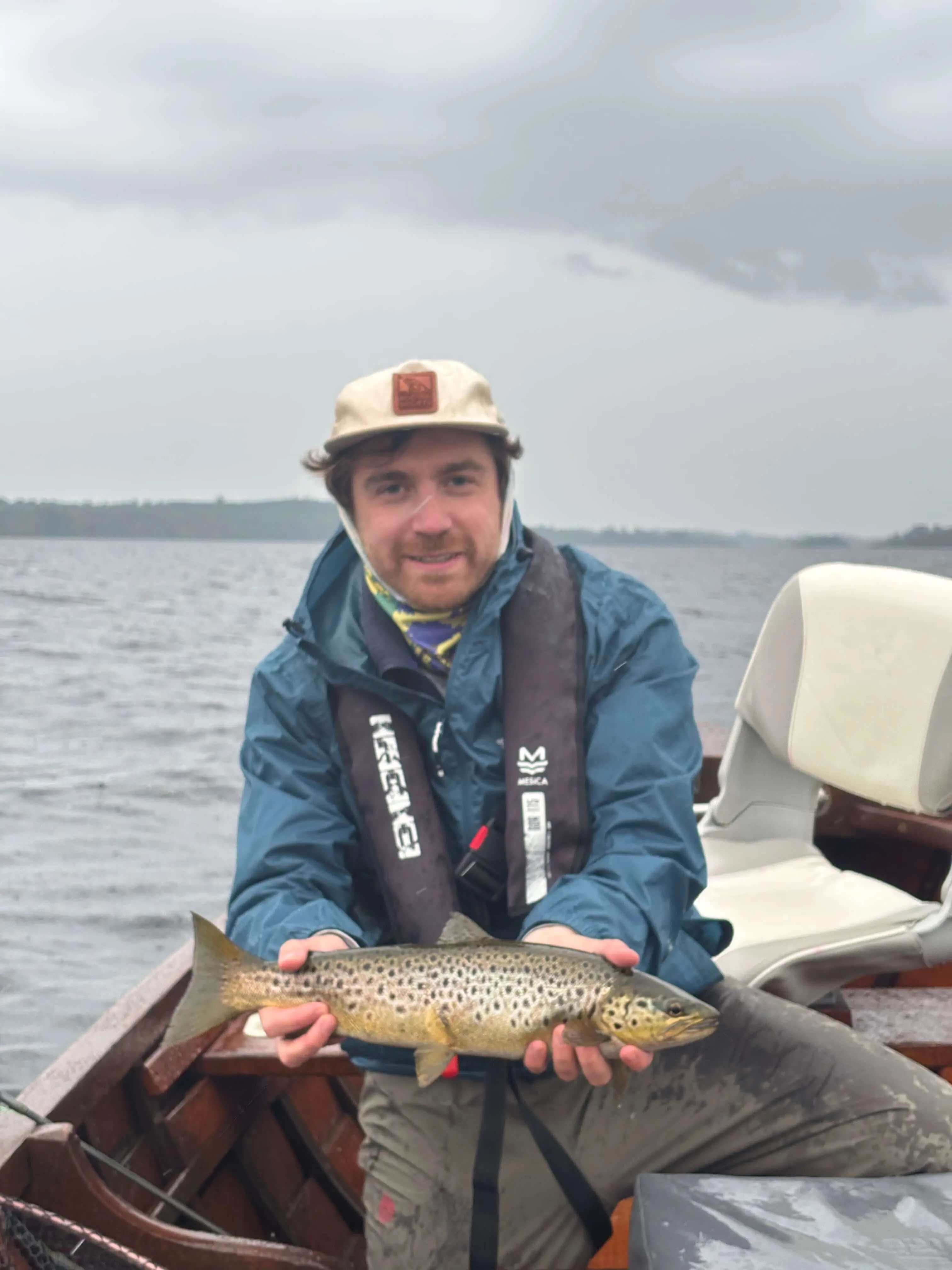 Close-up of a wild Irish lough brown trout before release near Cong, County Mayo