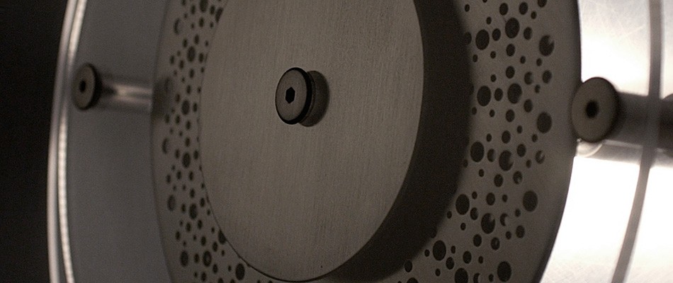 An industrial clock that uses light instead of hands to show time.