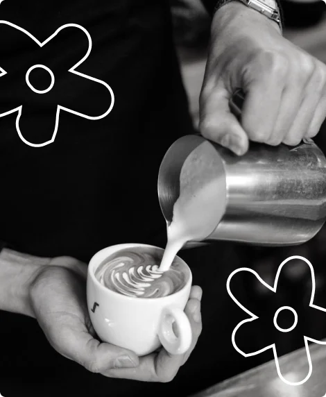 Barista pouring latte art