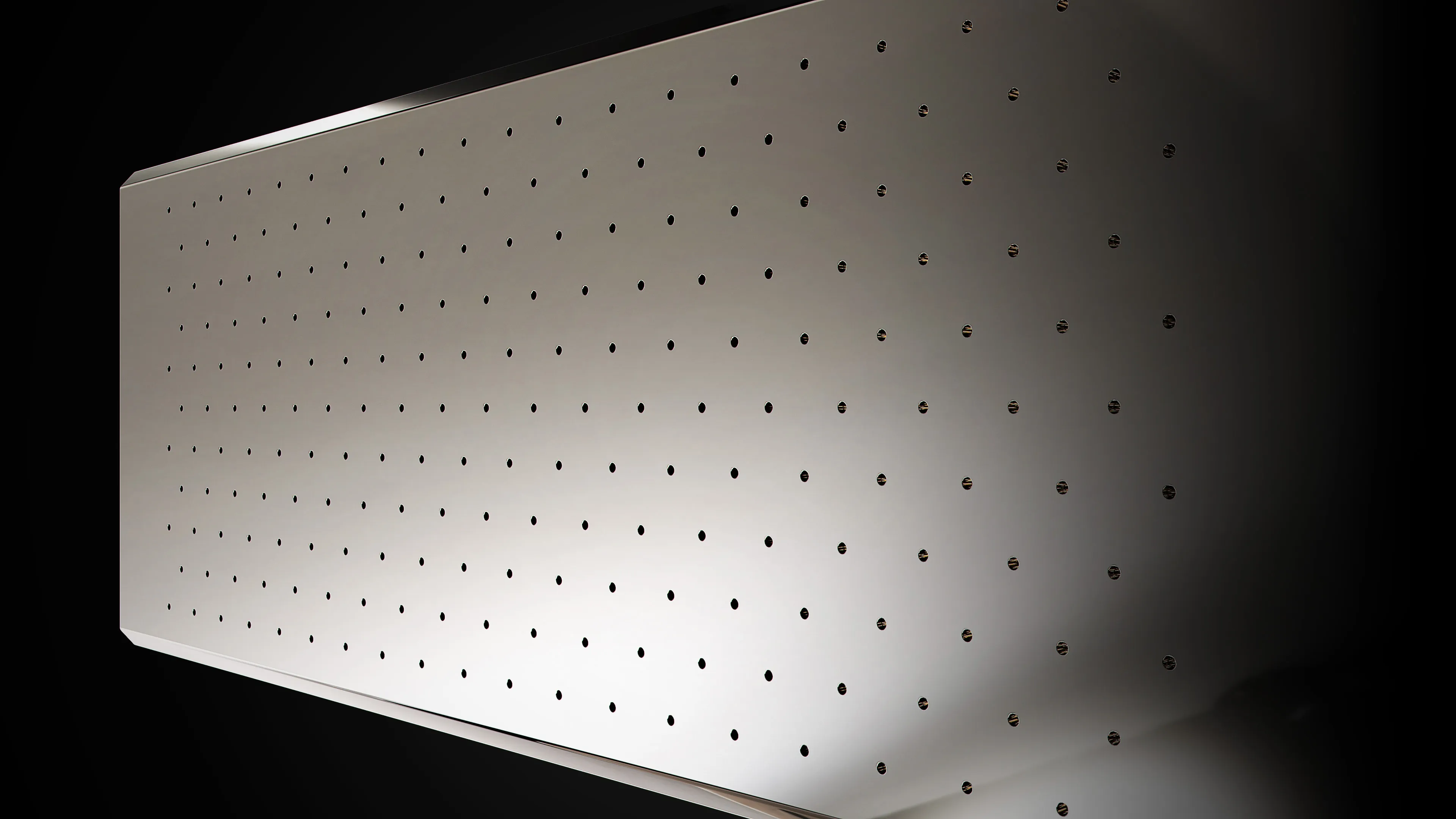 Close-up shot of the front suction plate with a grid of fine, evenly spaced circular holes. It securely holds the film initially, forming the basis of the multi-suction design for enhanced film stability.