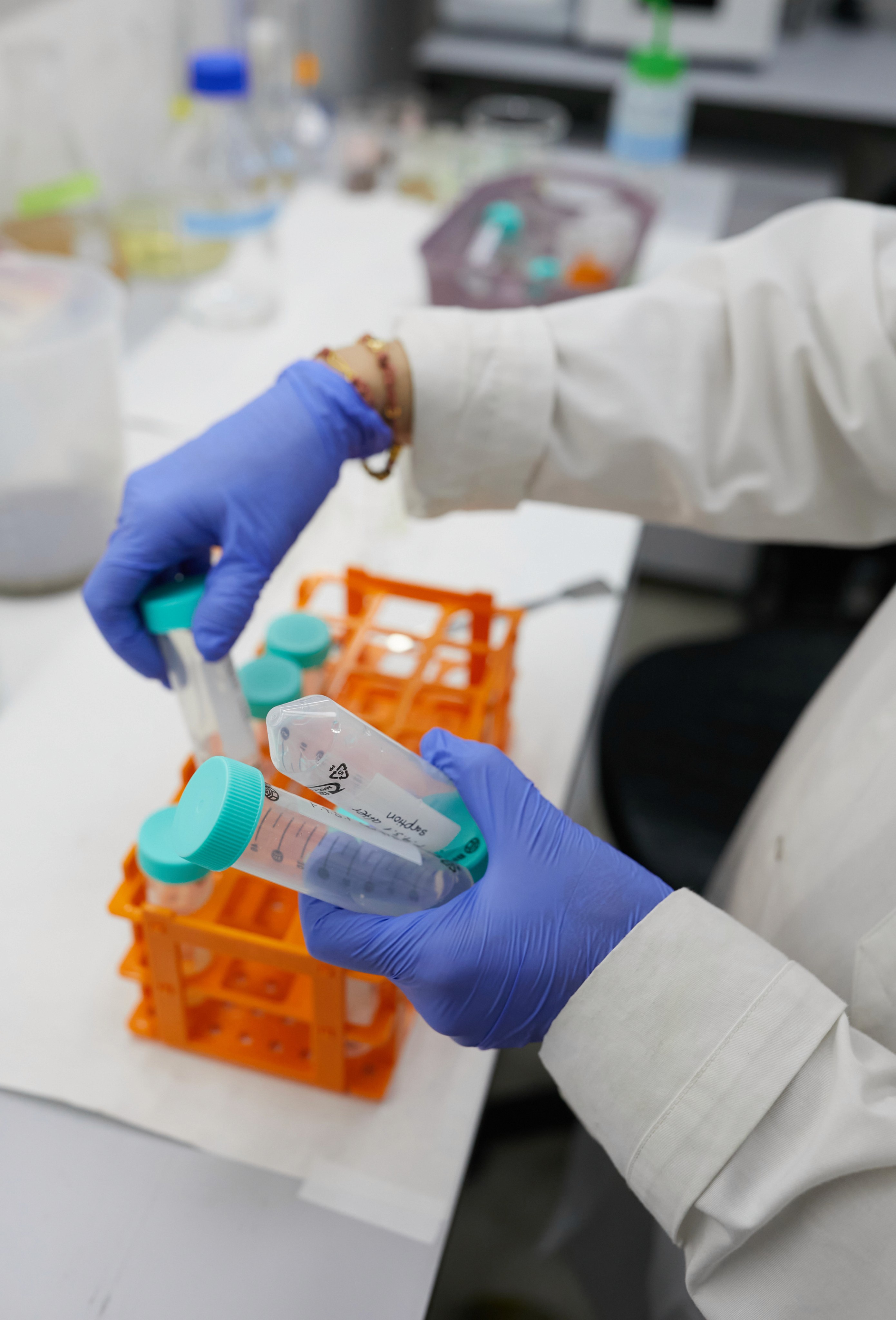 Gigablue researcher prepares experimental samples for analysis