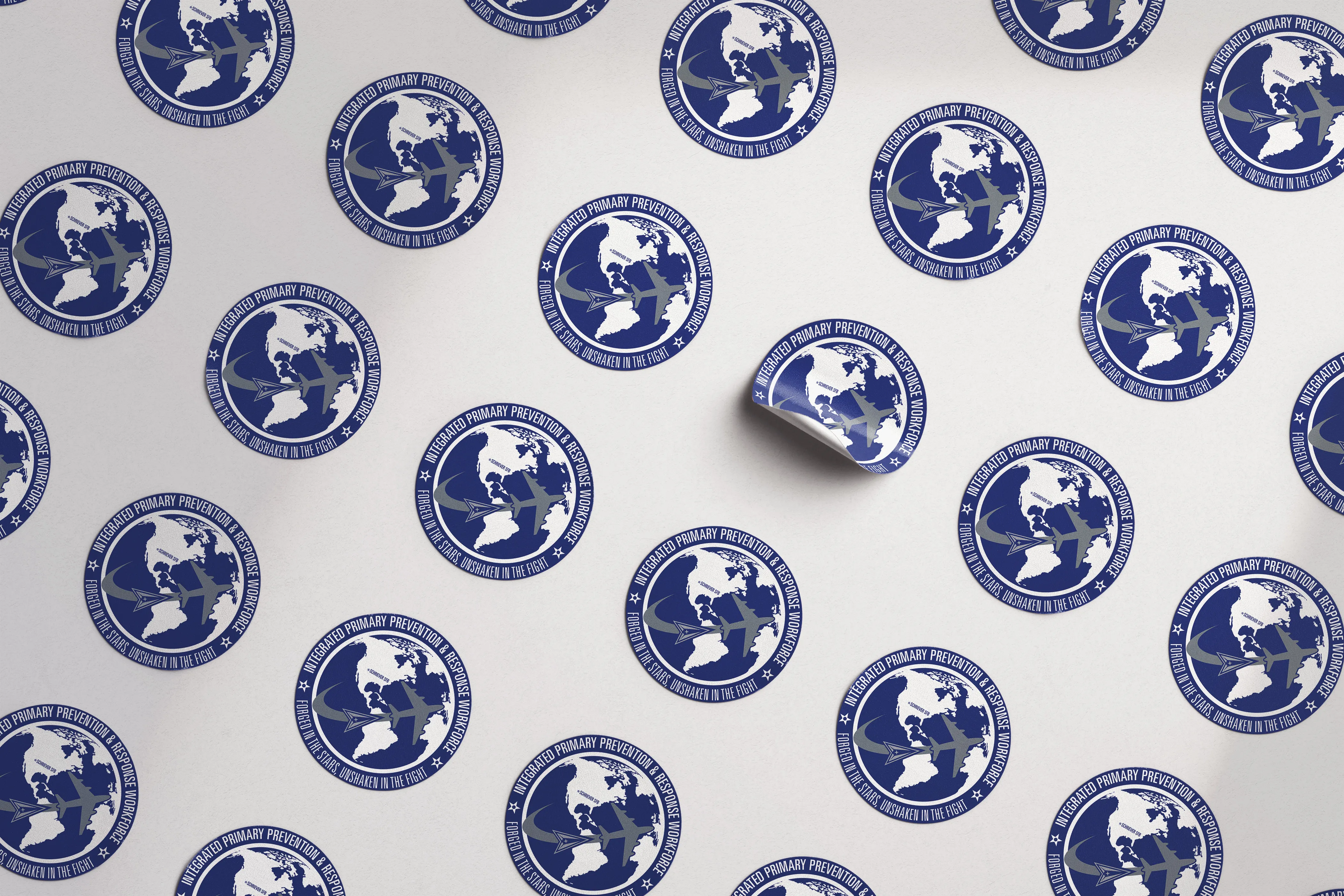 Streetside billboard with flyposters of the Batch.Works brand and illustrations