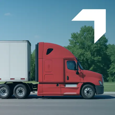 Red semi-truck on highway symbolizing semi-truck insurance.
