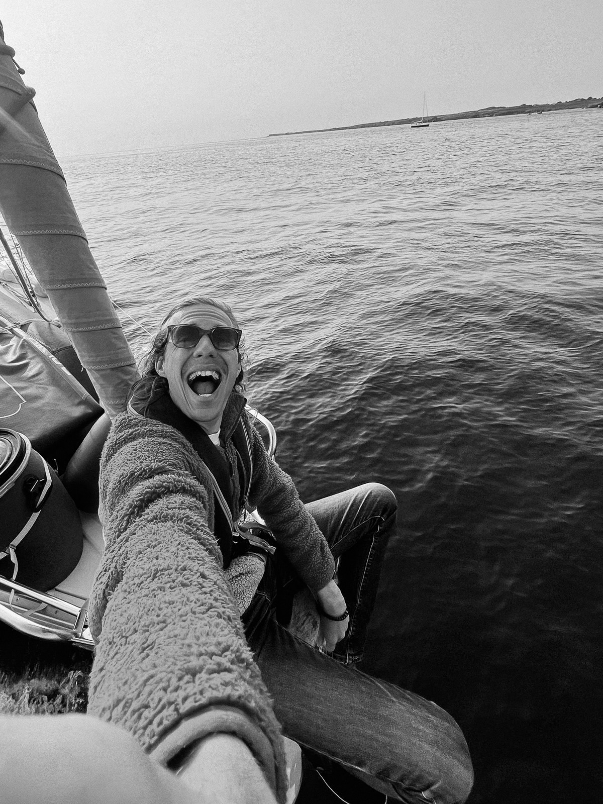 Photographer on a boat taking a selfie