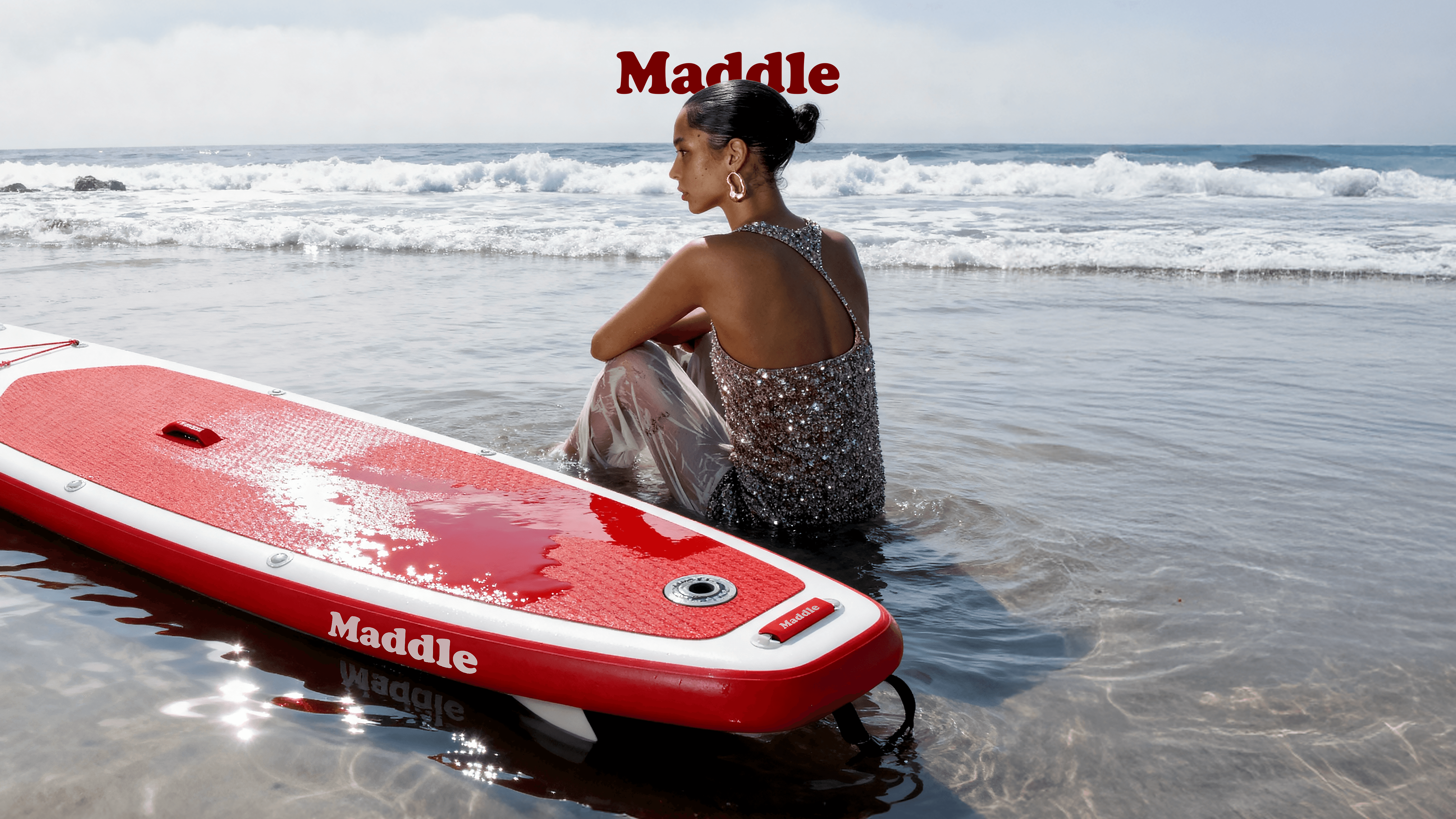 Streetside billboard with flyposters of the Batch.Works brand and illustrations