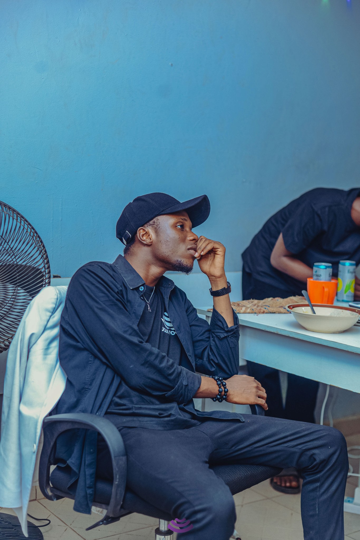 a person wearing a baseball cap