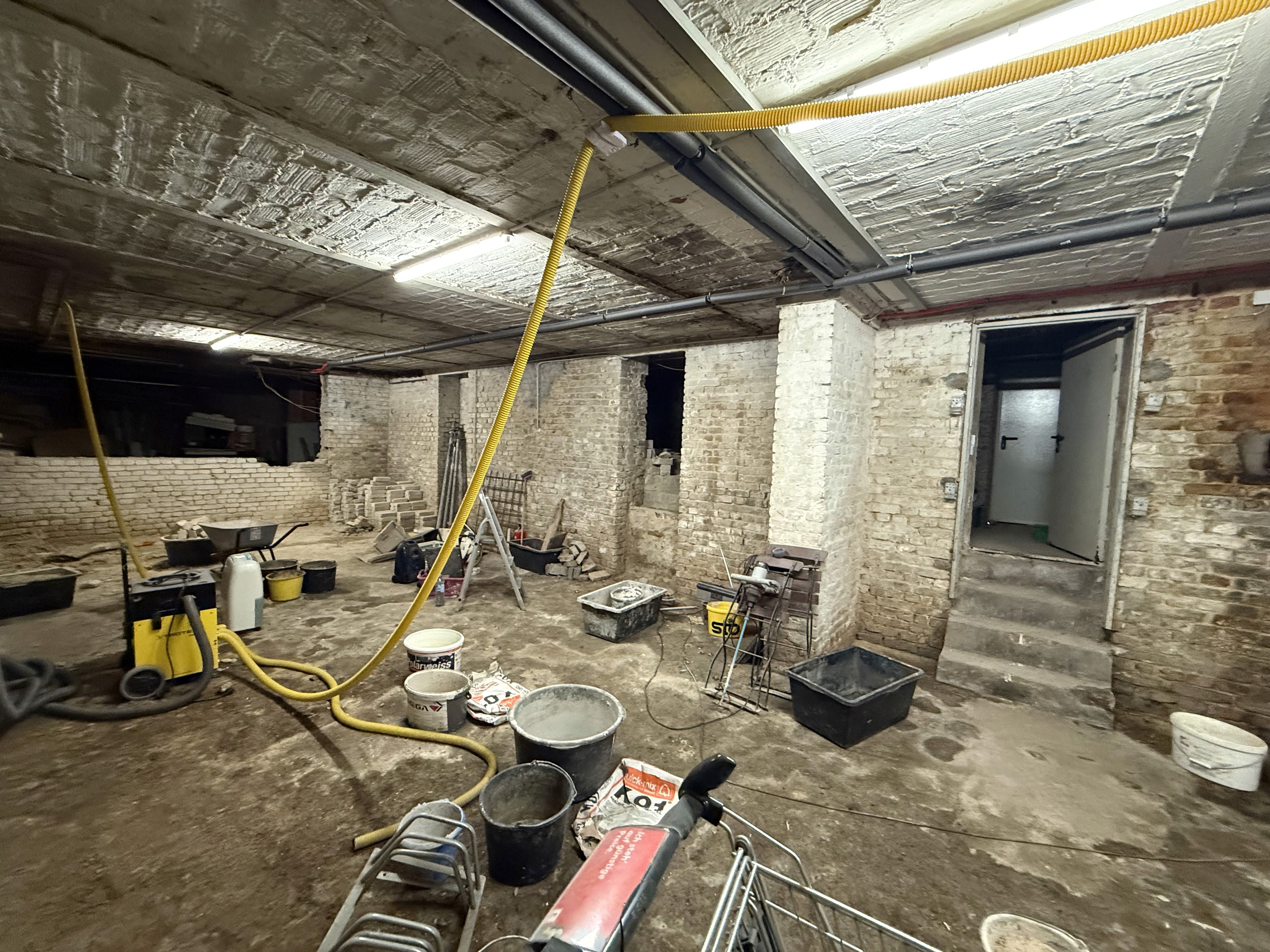 white and red wooden house beside grey framed magnifying glass