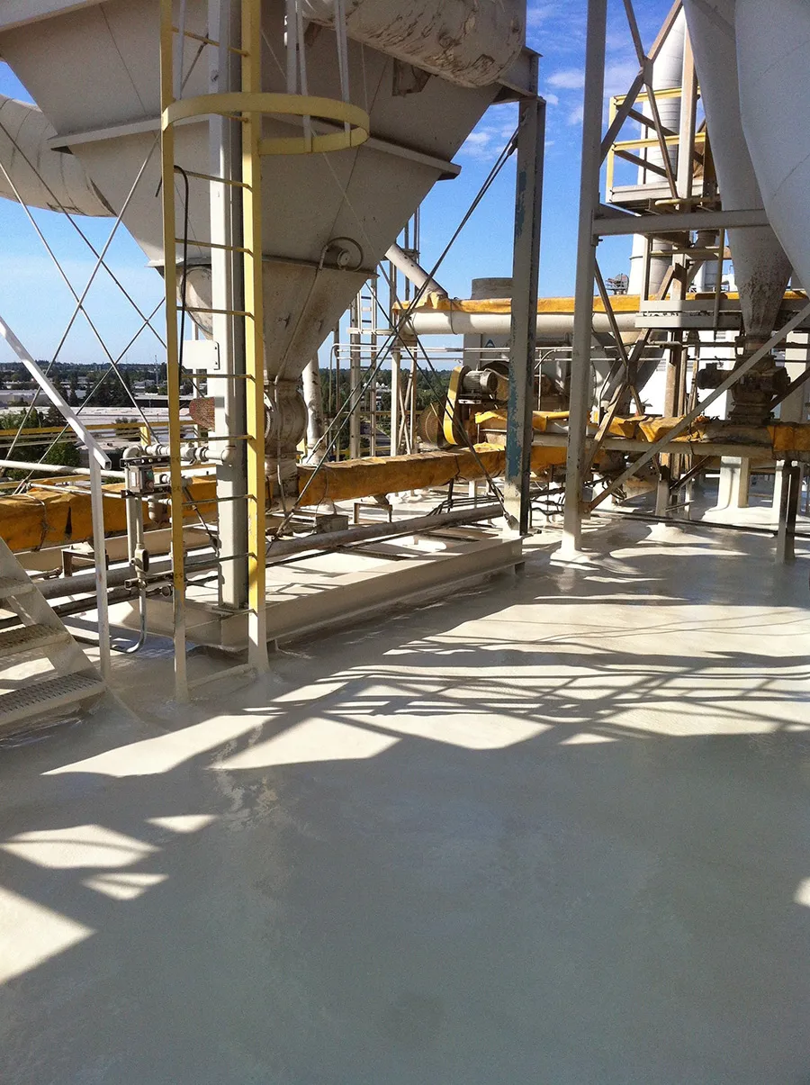 Polyurea protective coatings installed over new spray foam roofing system