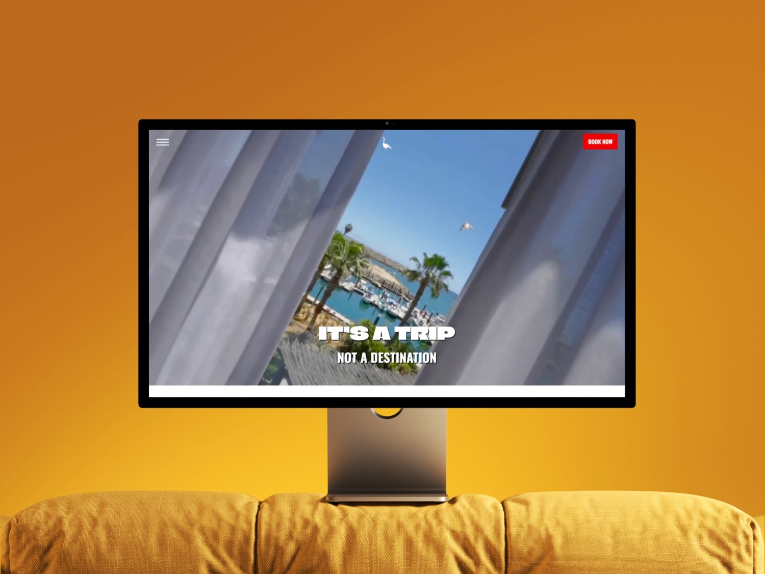 a person wearing a helmet and a cloak with a plain gradient background