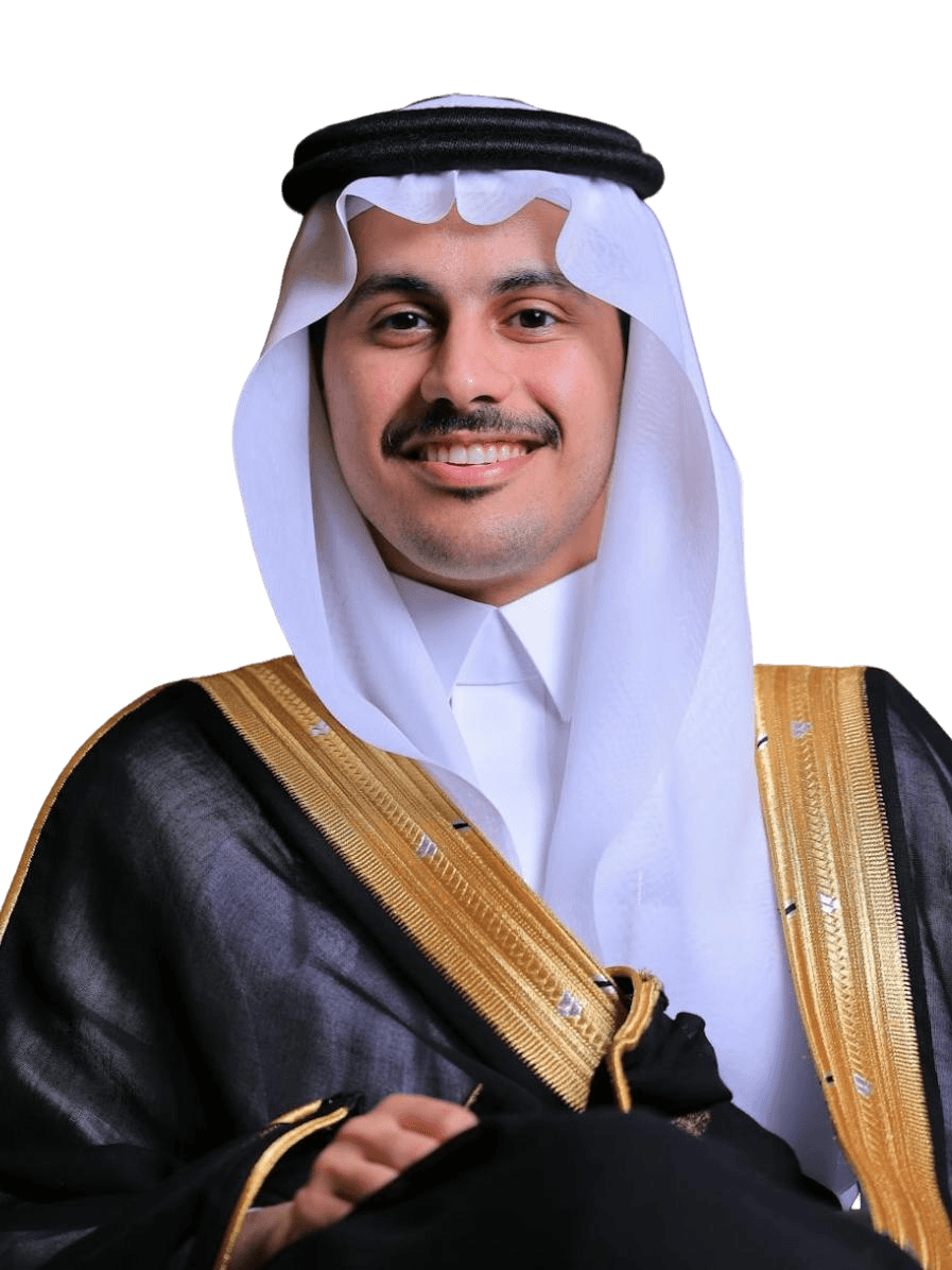 A couple of men standing next to each other on a beach