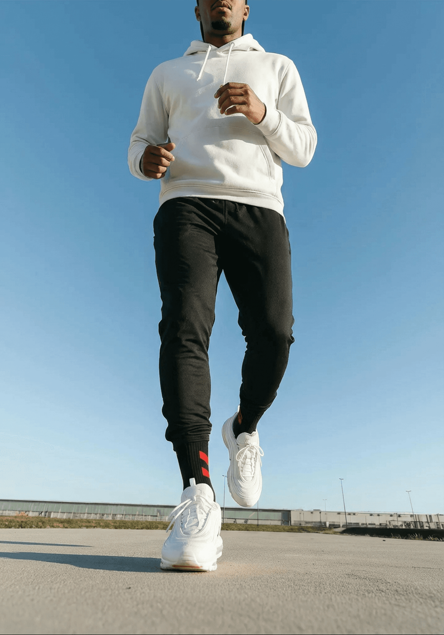 close up image of a man running in sneakers