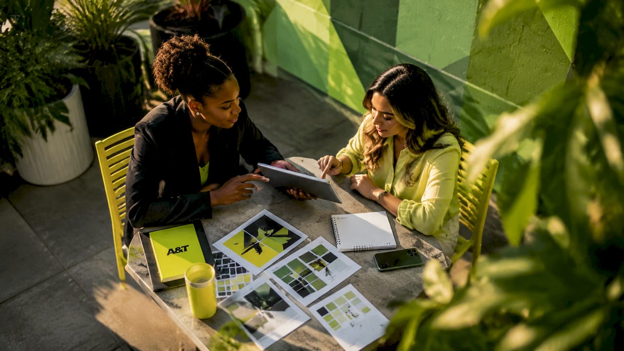 Diverse team collaborating on ad campaign strategies