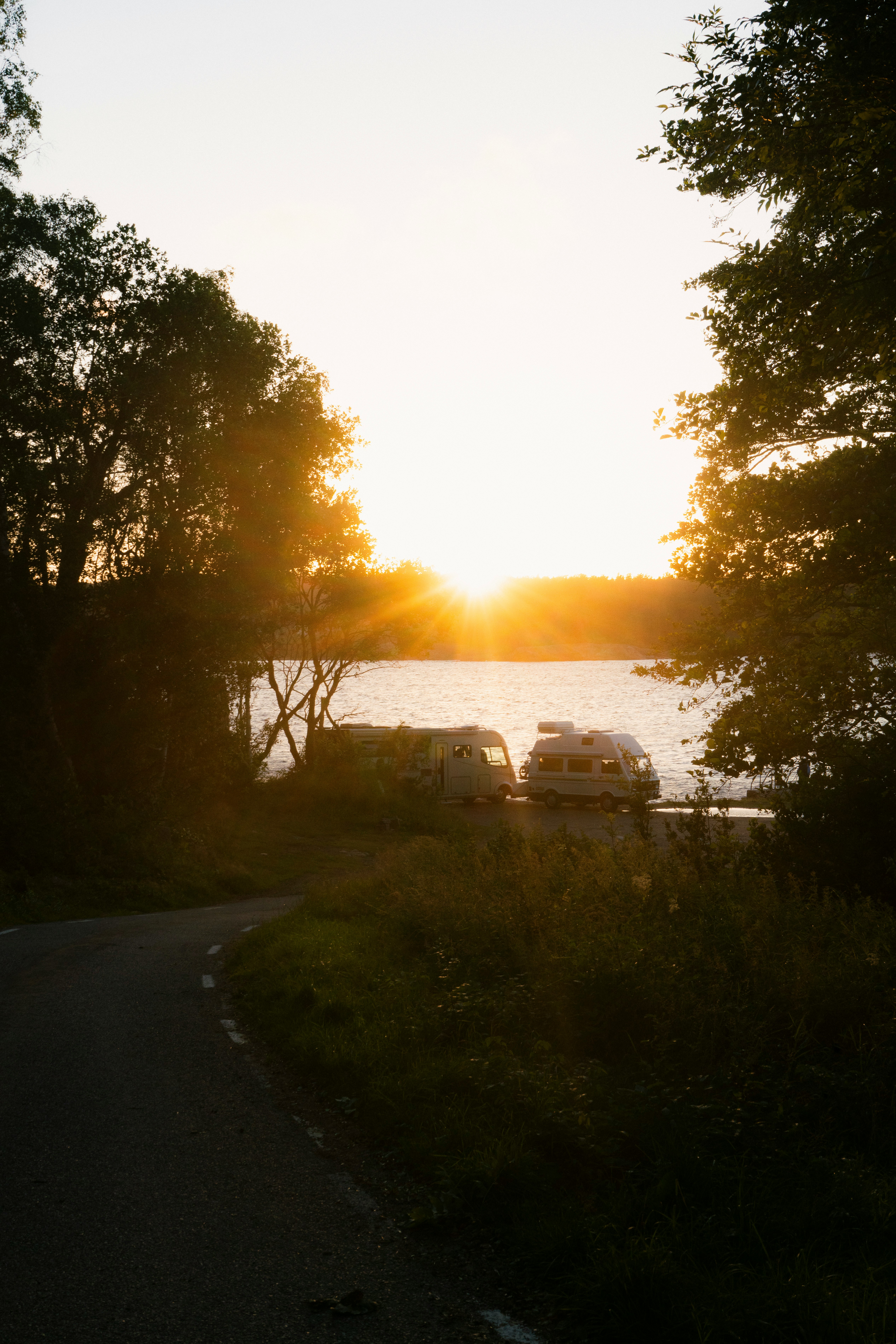 The sun is setting over a body of water