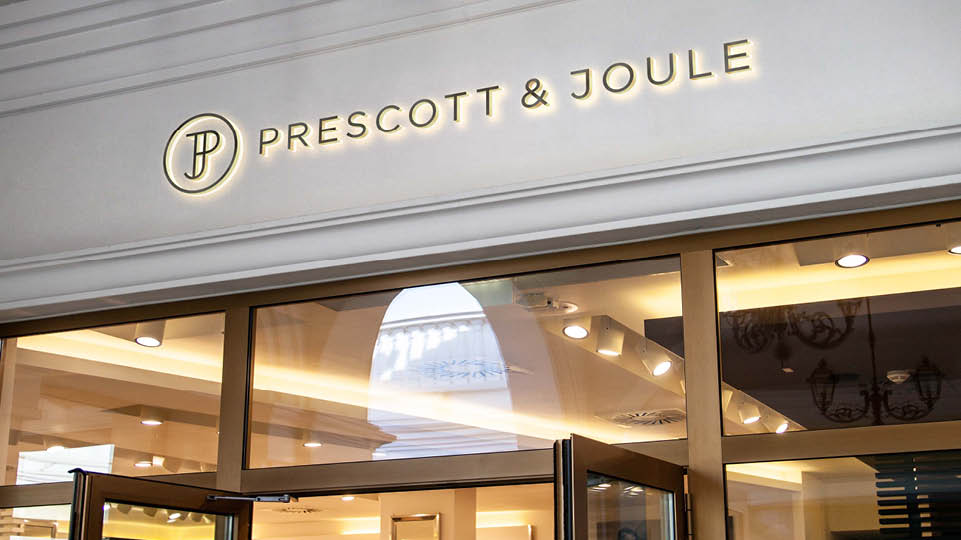 a pair of cell phones on a concrete block