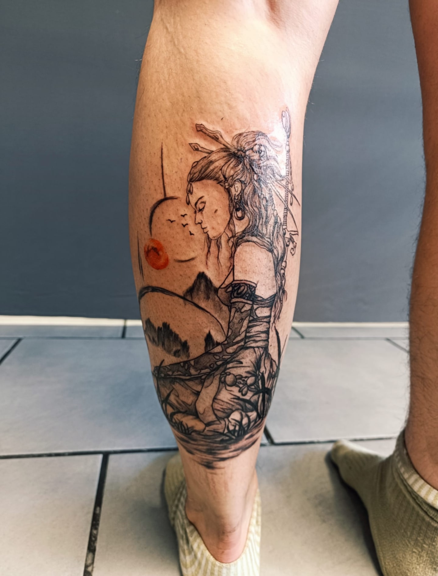 tatouage style japonais mollet homme