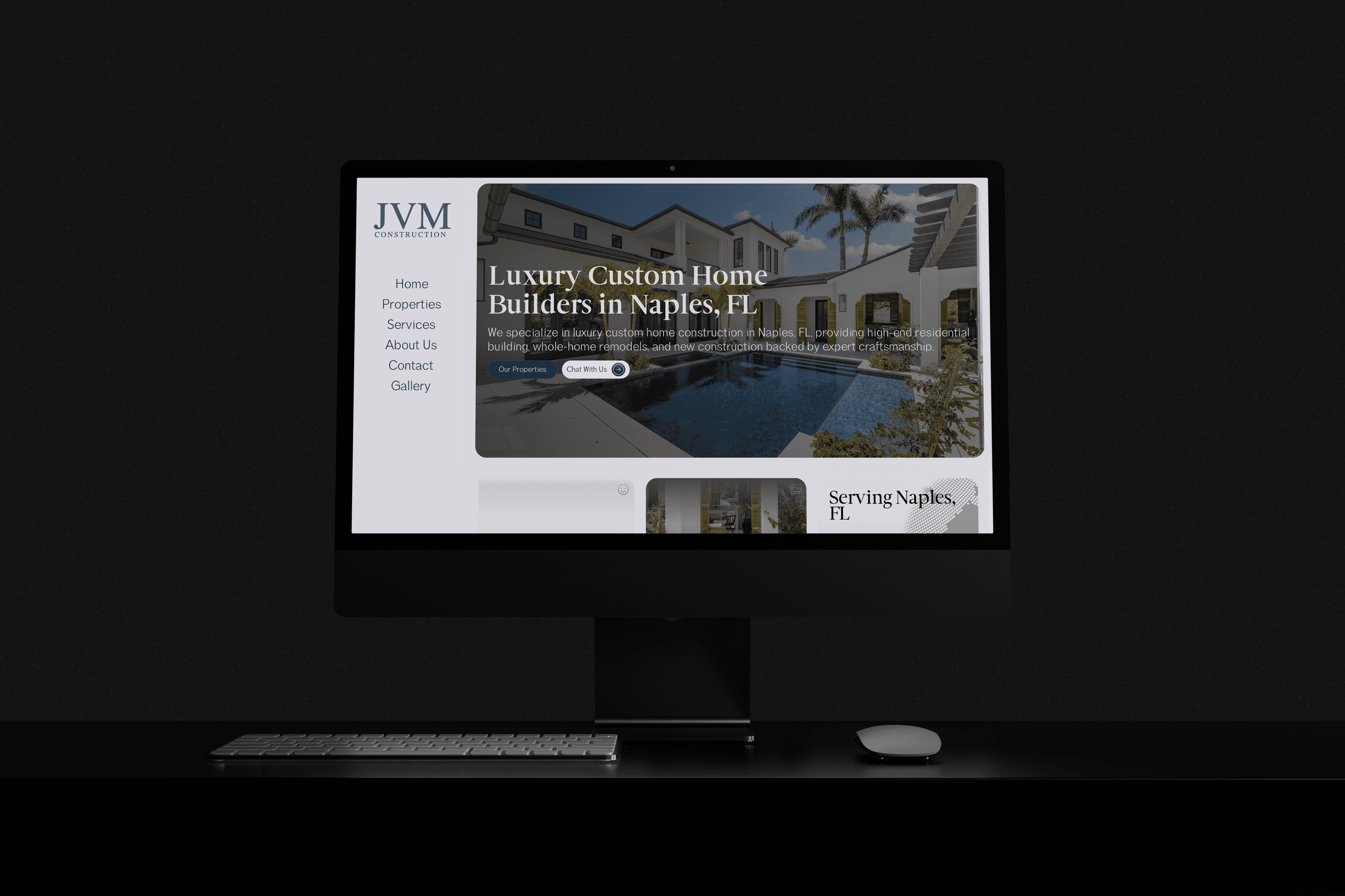 a dark room with a large monitor showcasing a website