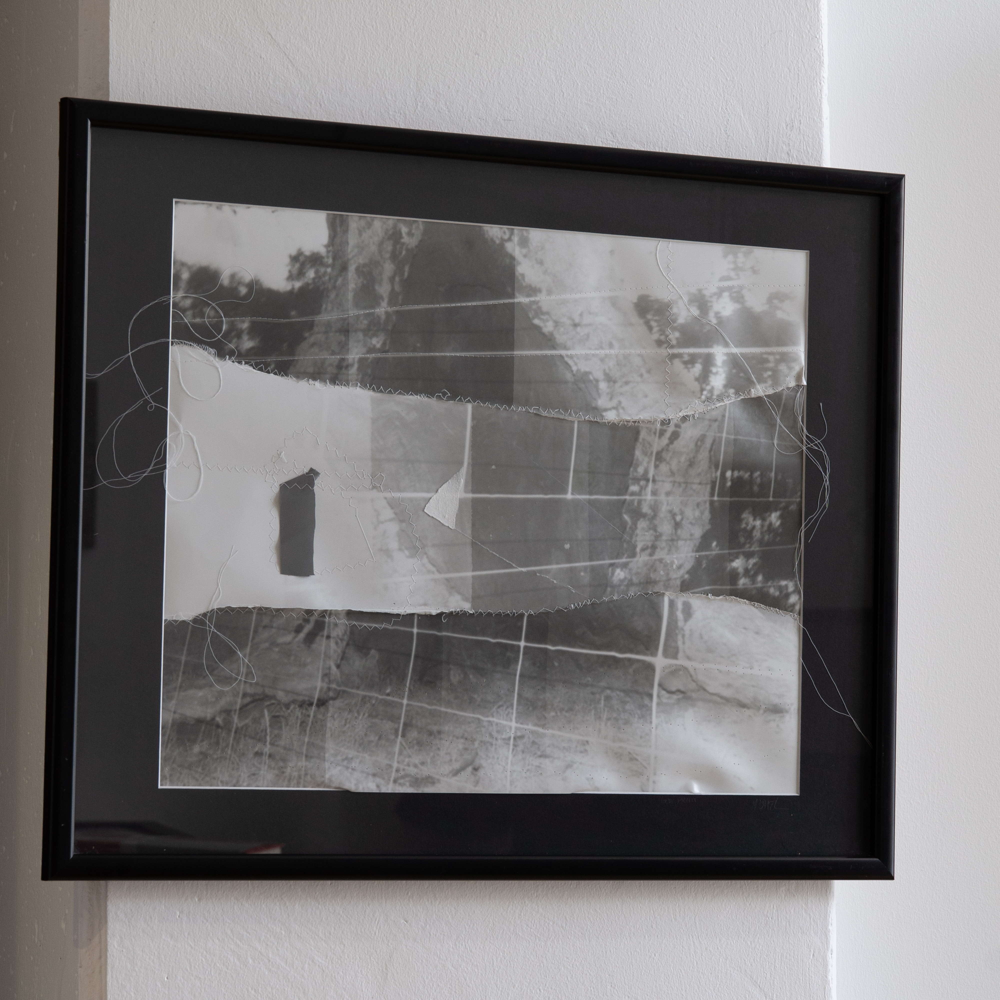 Darkroom prints drying on wire racks