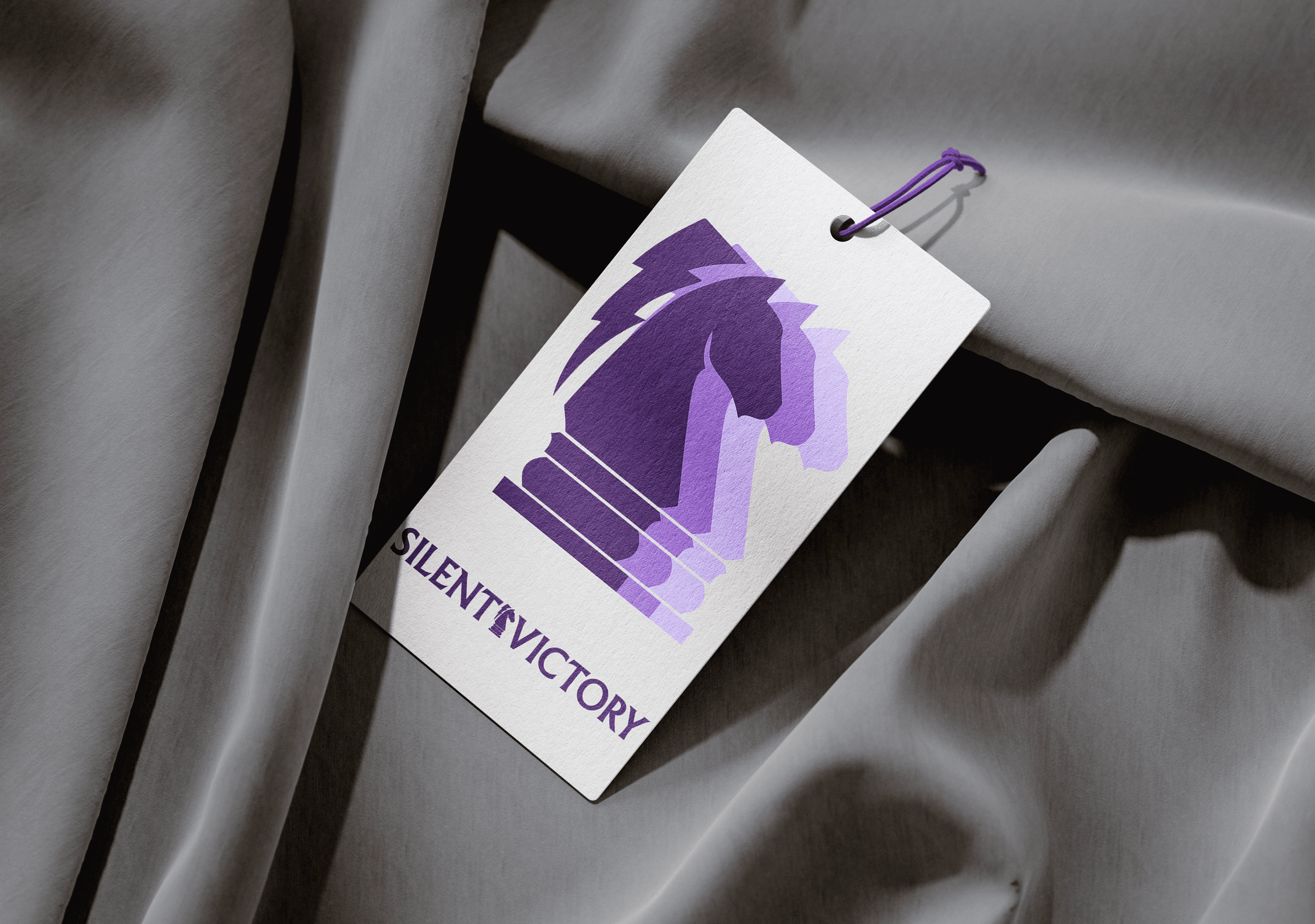 A clothing tag with Silent Victory branding on it
