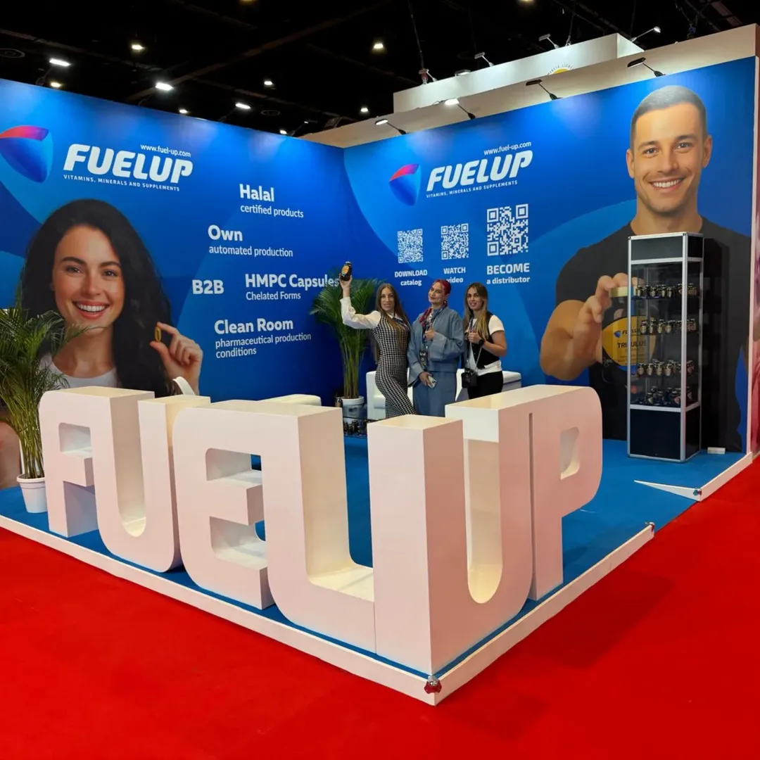 person writing on a piece of paper