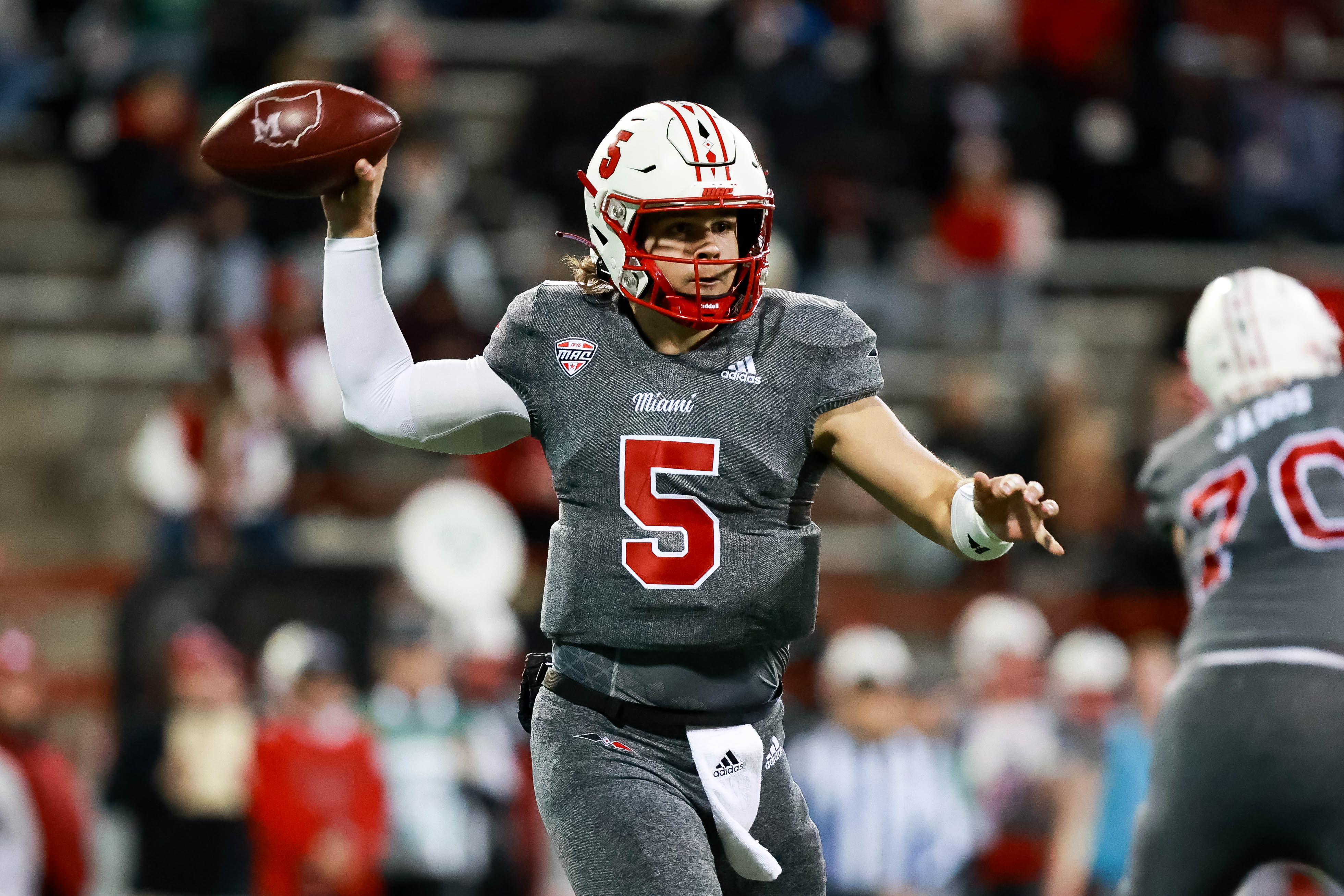 Brett Gabbert drops back to attempt a pass during a college football game at Yager Stadium in Oxford, OH. (Shelby Frieszell/Undrafted)
