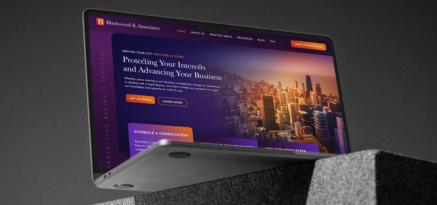 Website design for Blackwood & Associates displayed on a laptop — dark financial advisory site with city skyline imagery
