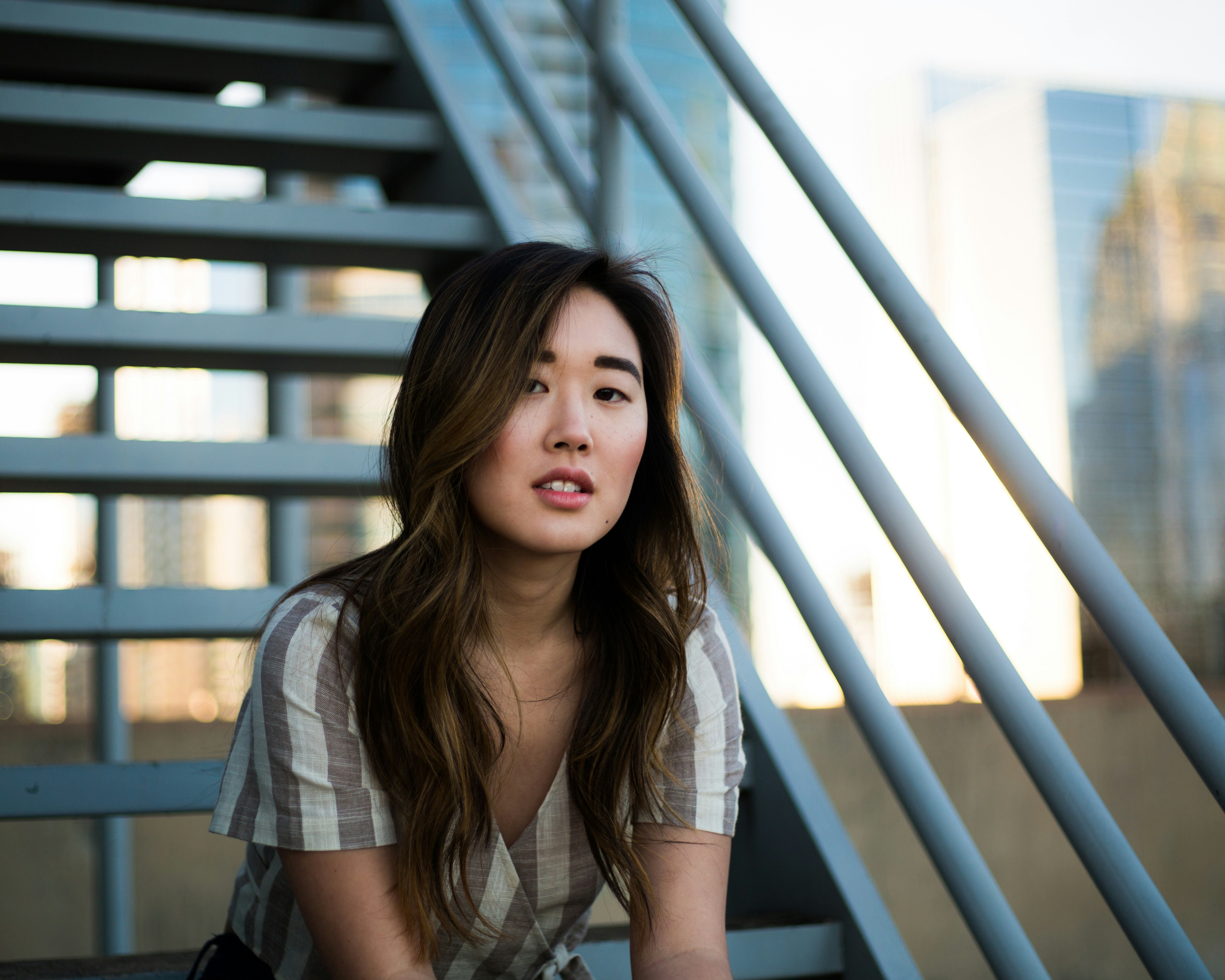 woman sitting on stairs - How to Find Your Color Palette