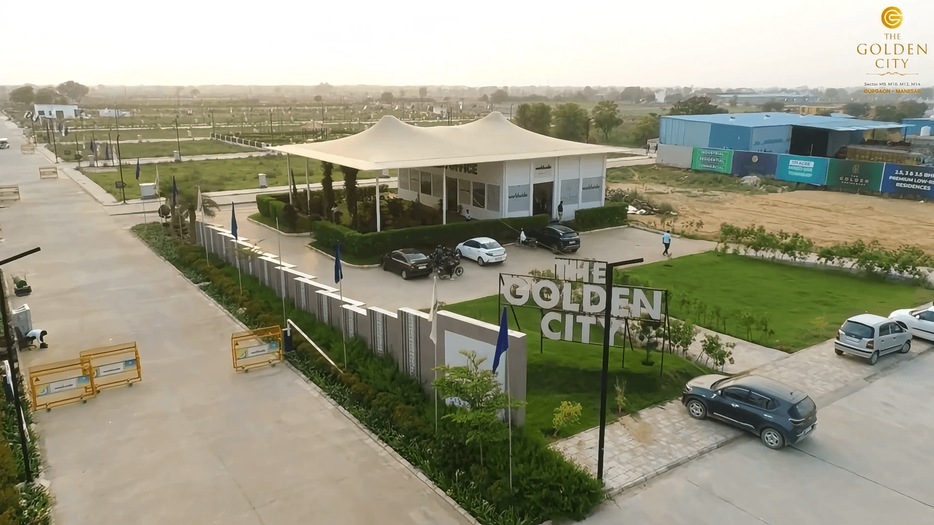 Modern suburban house with tan siding and stone accents at dusk.