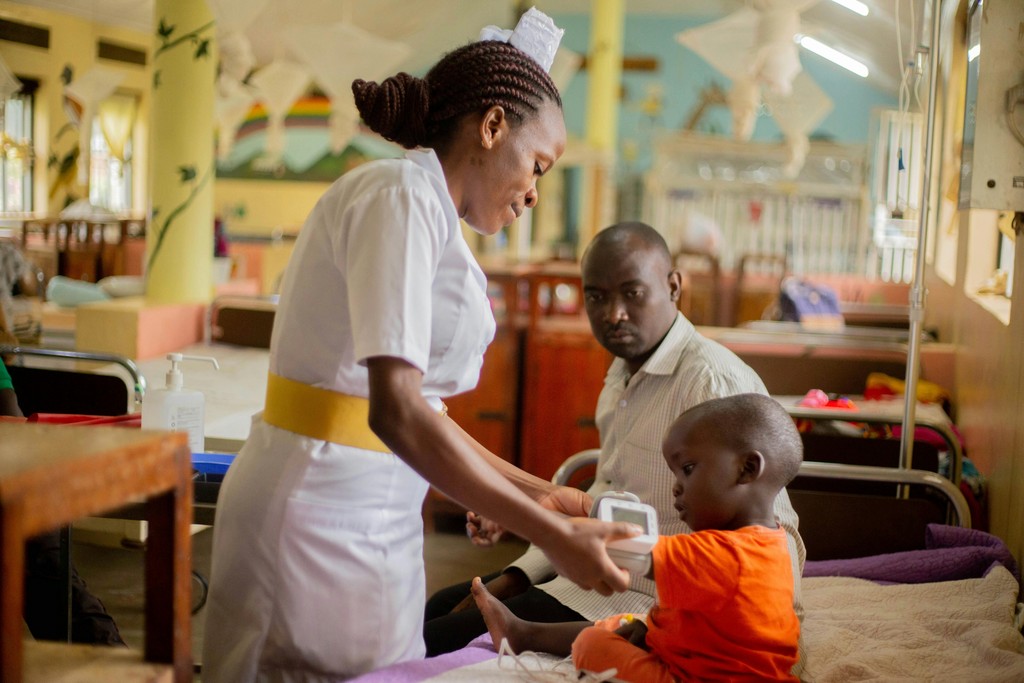 Health. Patience receiving an injection.