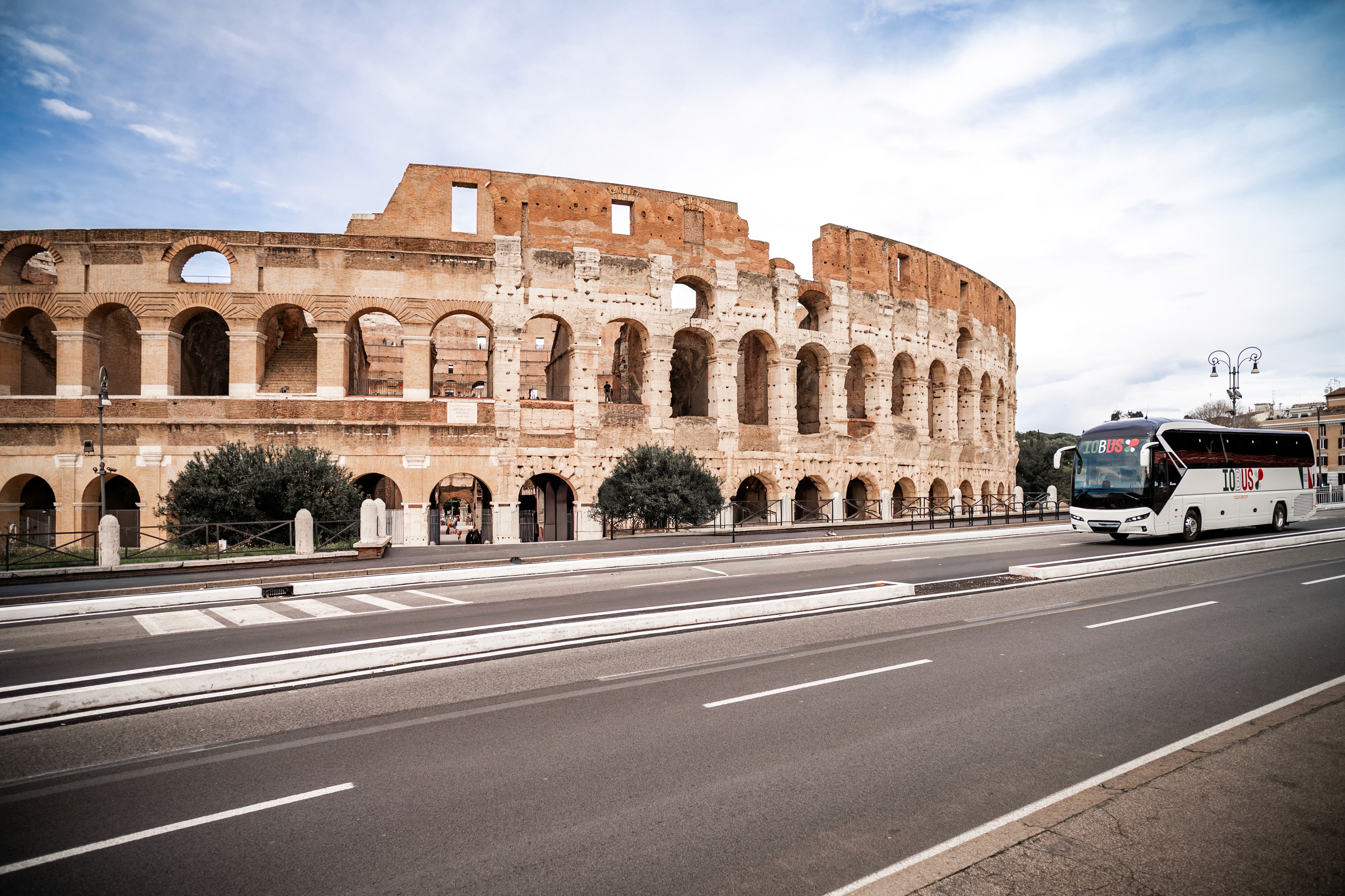 photo of brown bench near swimming pool