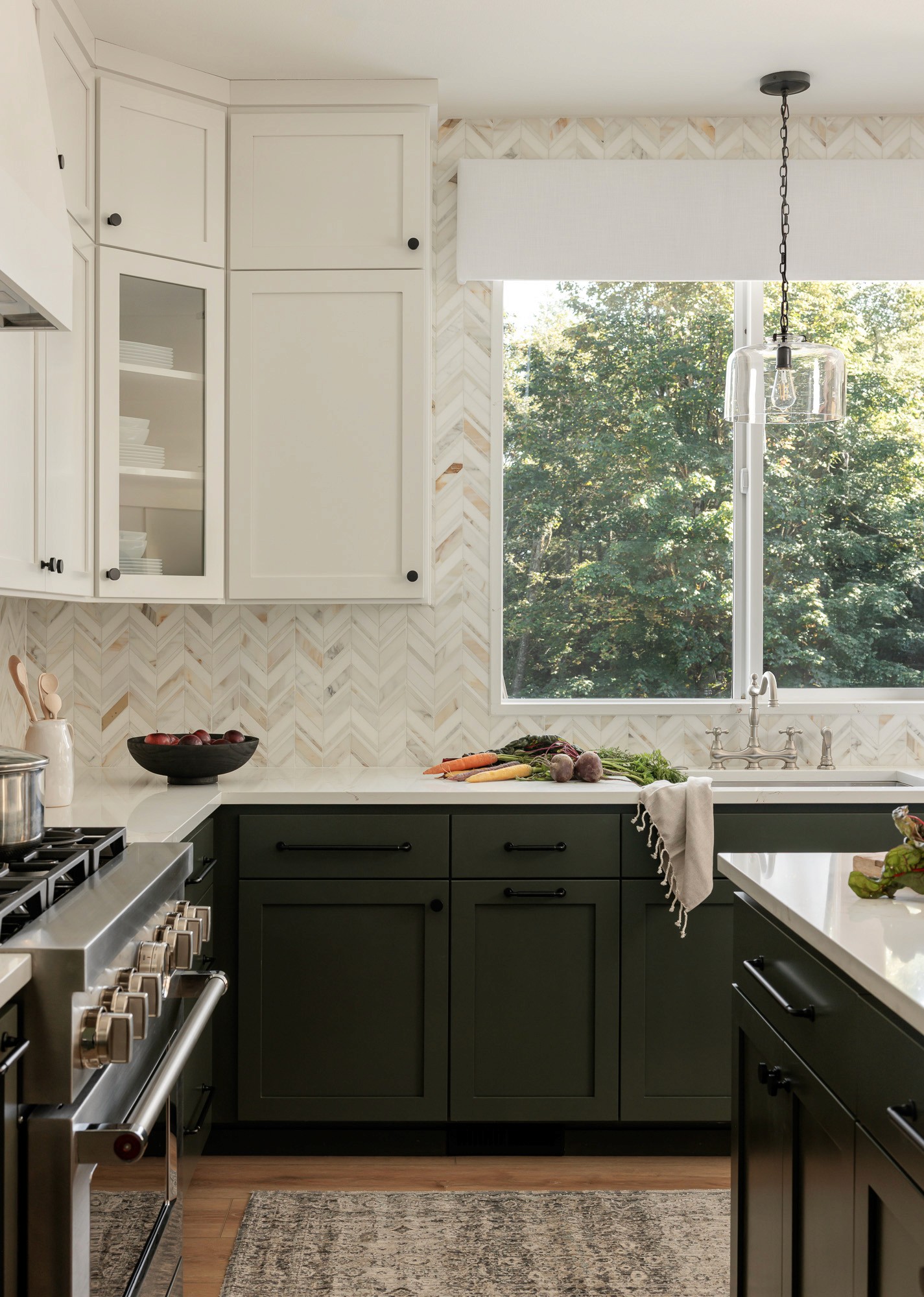 The kitchen in the Ravensdale House Project designed by Elegant Simplicity in Seattle Washington