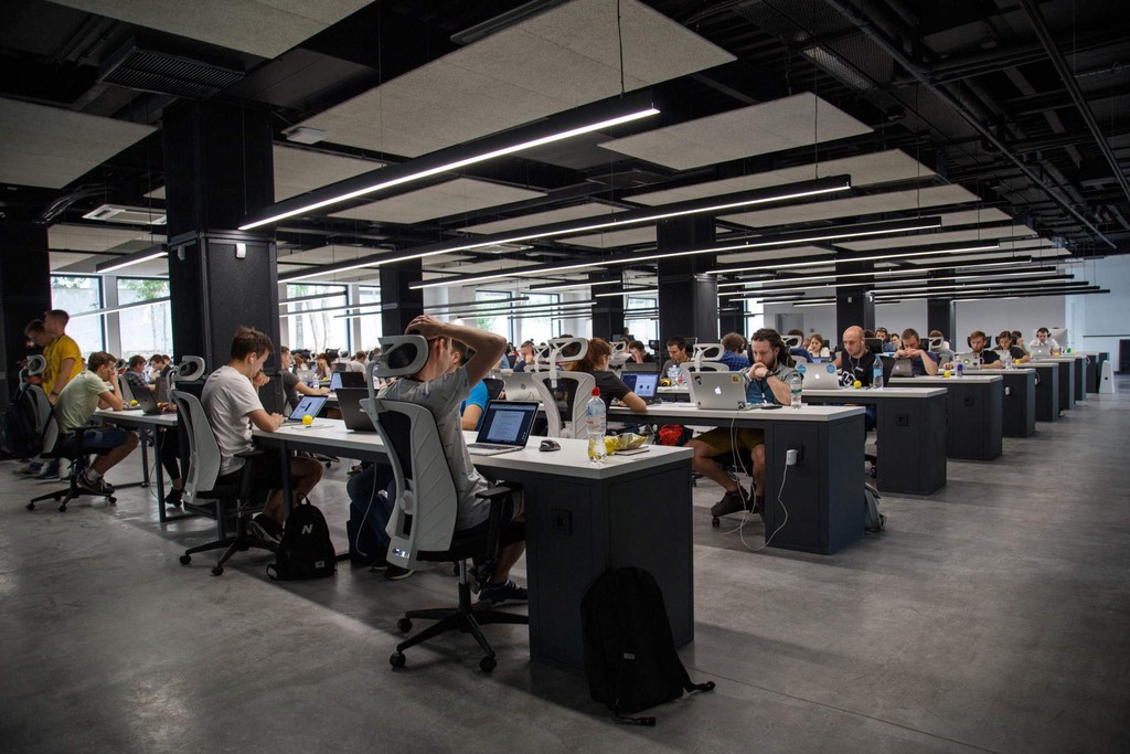 A photo of a modern office with staff