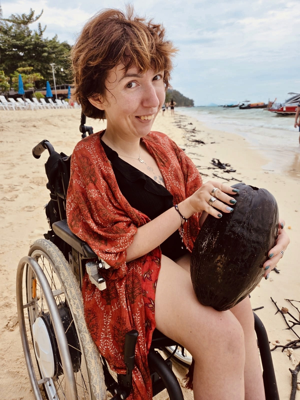 woman in white dress sitting on swing