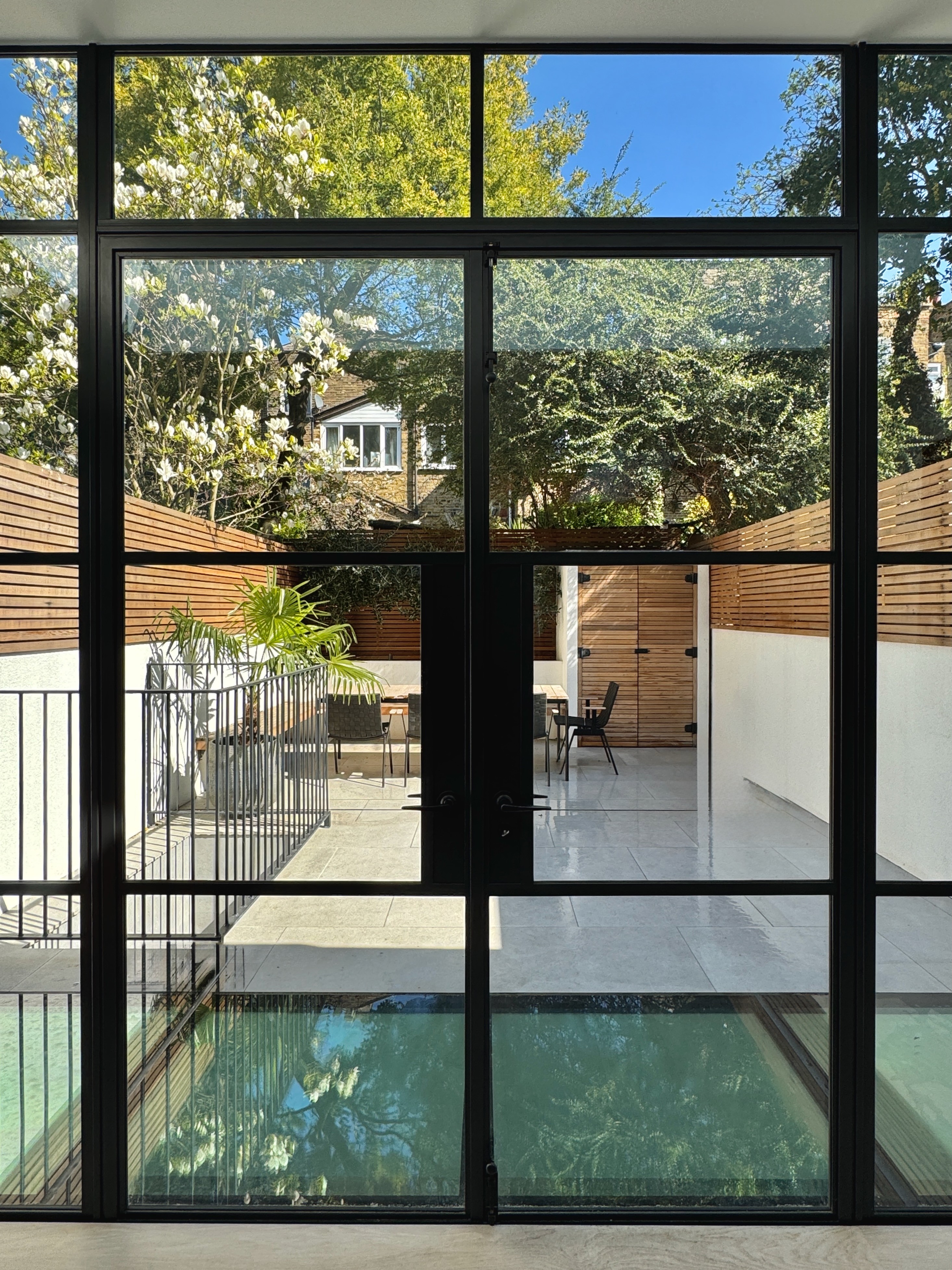 orange throw pillows on white couch