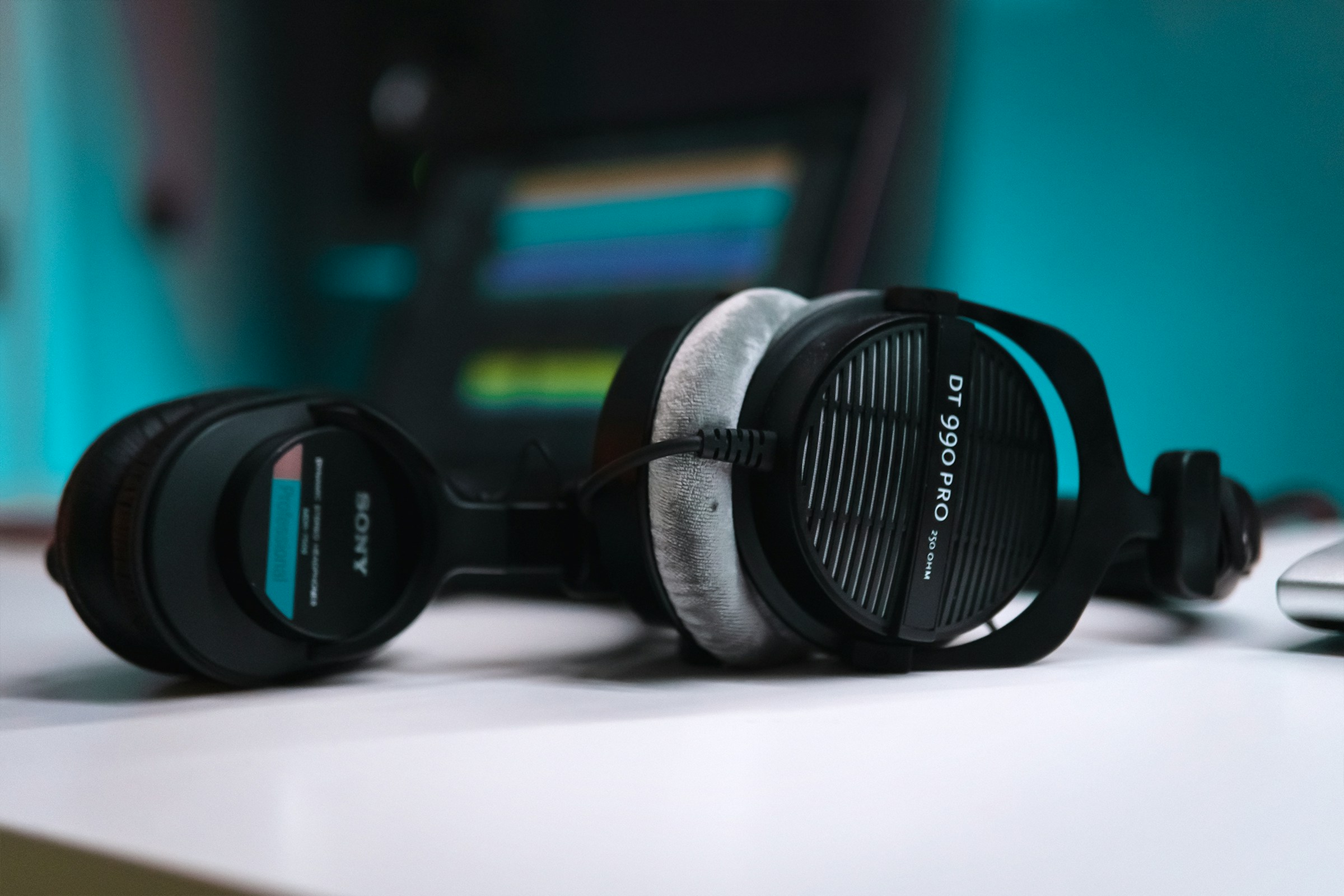 heaphones on table - Best Headphones for Recording Music